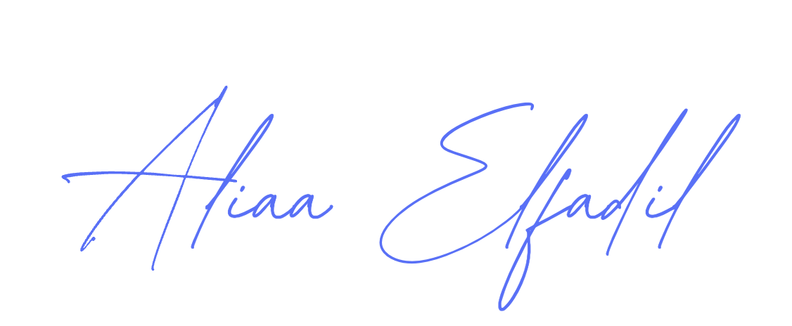 Signature reading 'Aliaa Elfadil' in blue cursive on a white background.