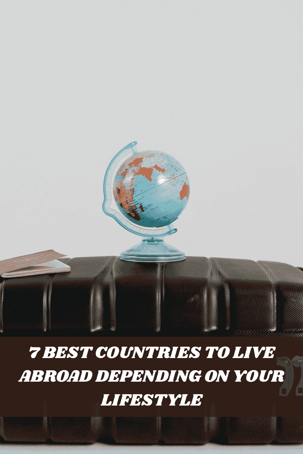 best countries to live abroad globe on suitcase travel and expat lifestyle concept