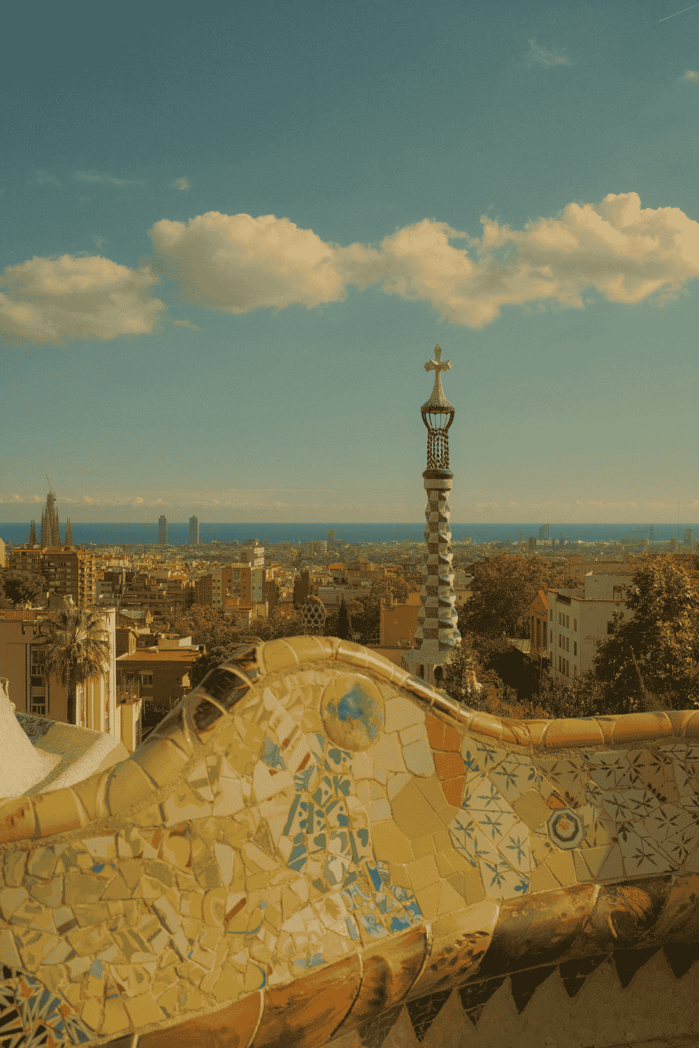 Barcelona city view from Park Güell with colorful mosaic architecture and skyline in Spain