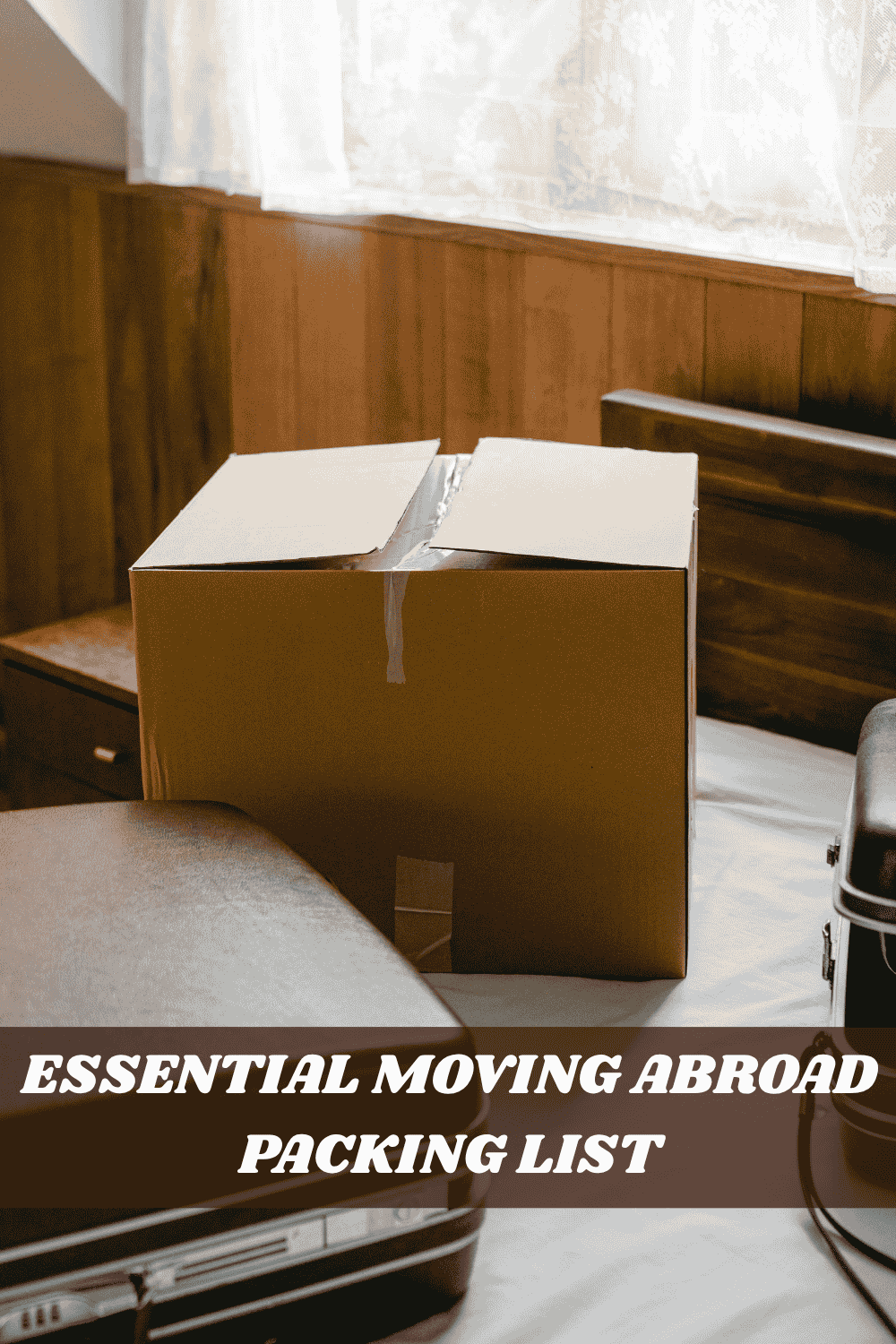 moving abroad packing list with suitcase and cardboard box ready for relocation abroad