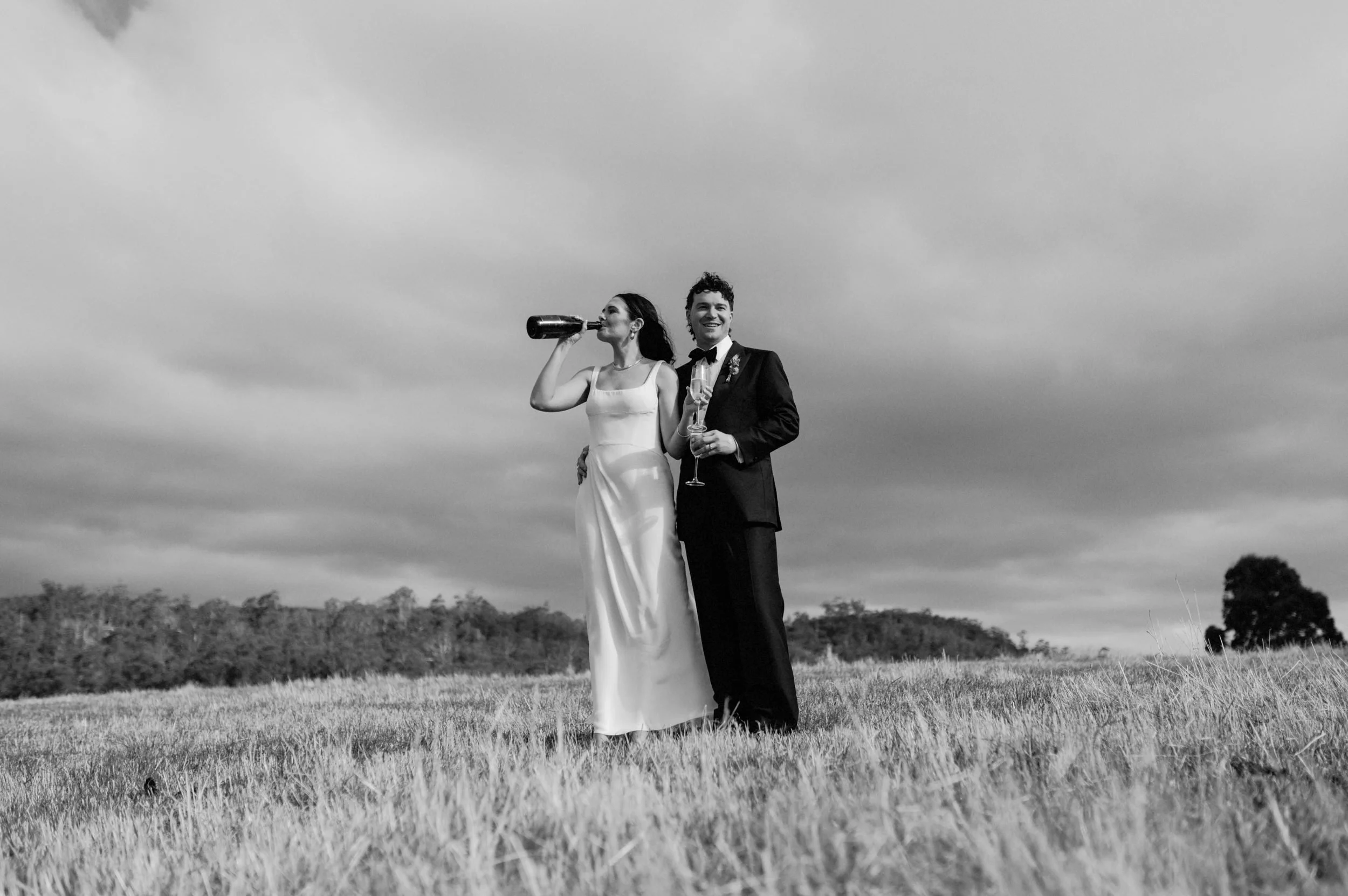 A couple drinking Champagne at Premaydena Hill Winery, in Tasmania