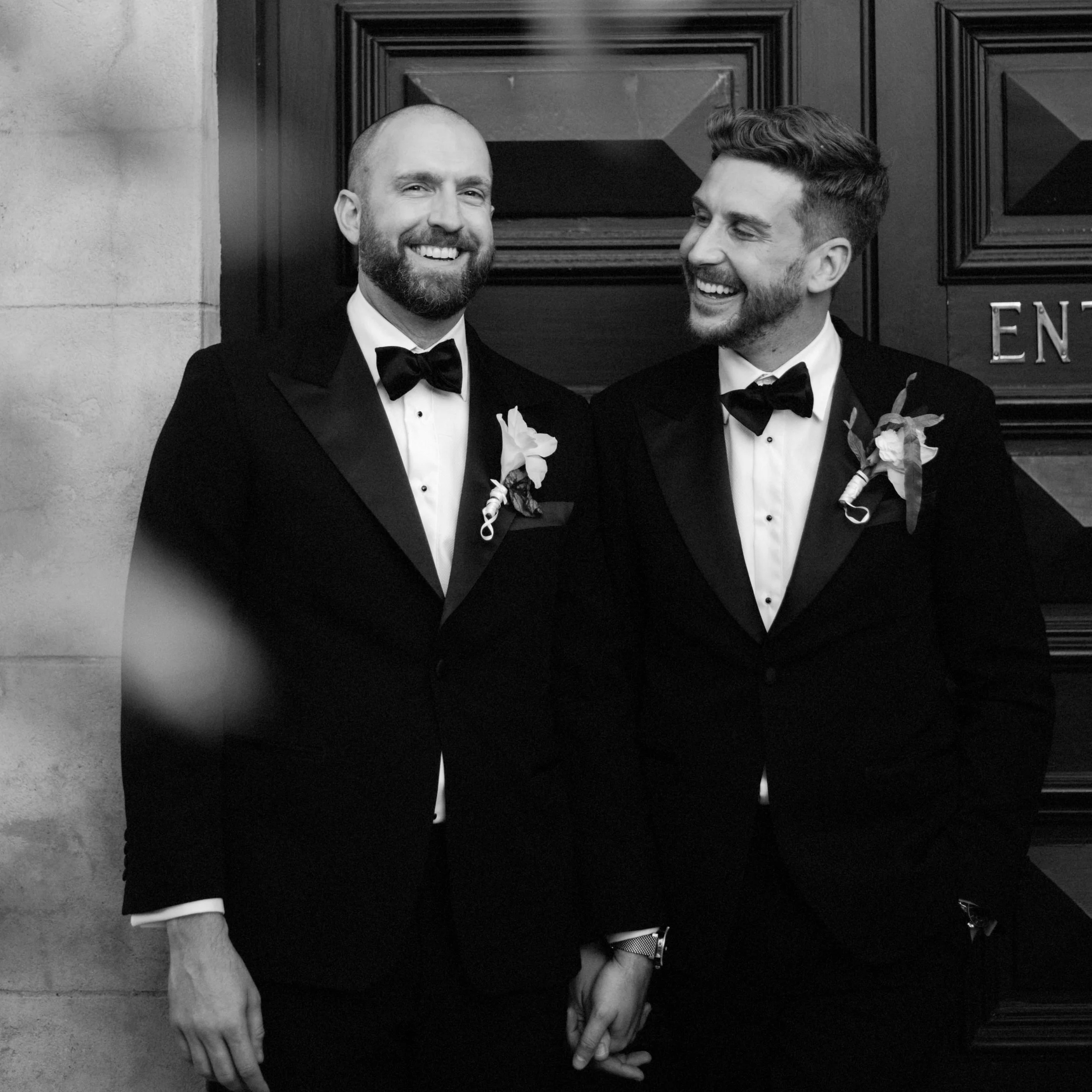Two men dressed in tuxedos at their wedding at Stefano Lubiana Winery