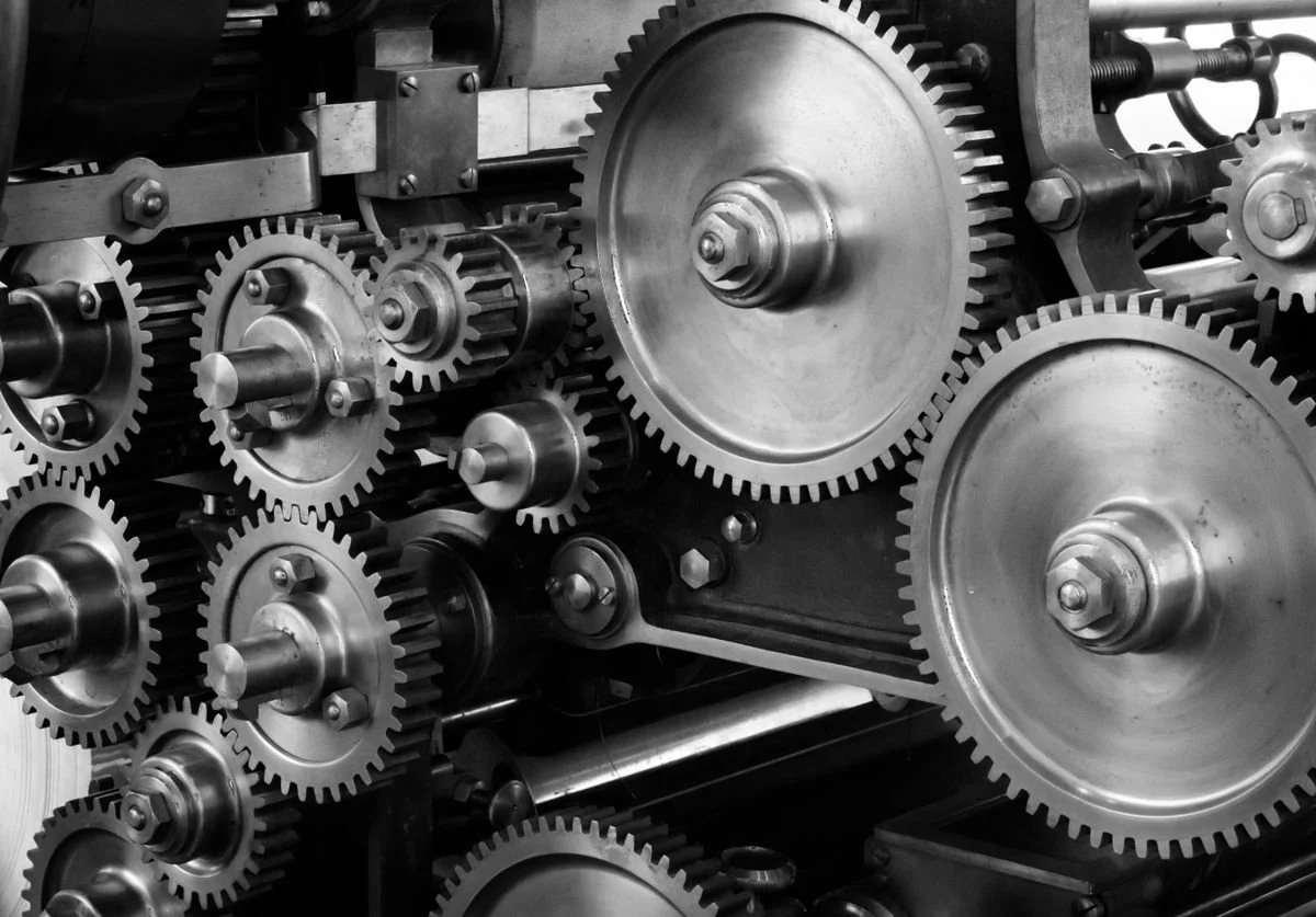nuts-and-bolts-machinery-moving-together.-nomadic-virtual-solutions-wellnessjpg