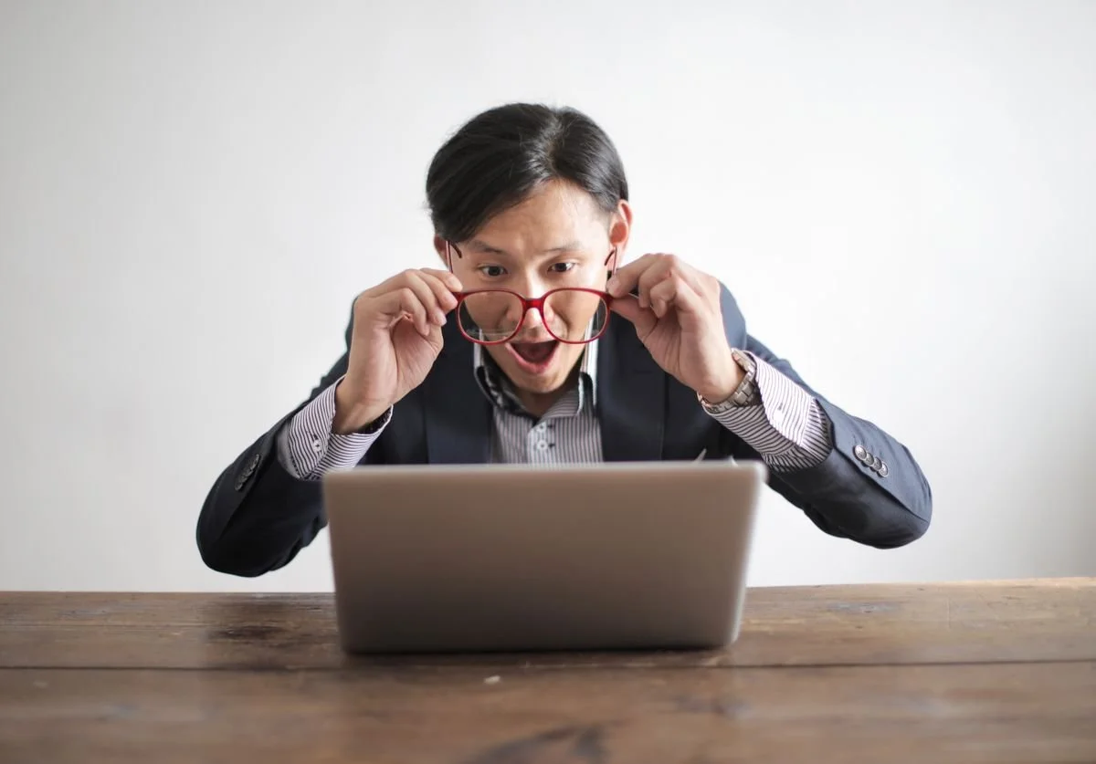 a-guy-reading-something-shocking-on-the-computer.jpg