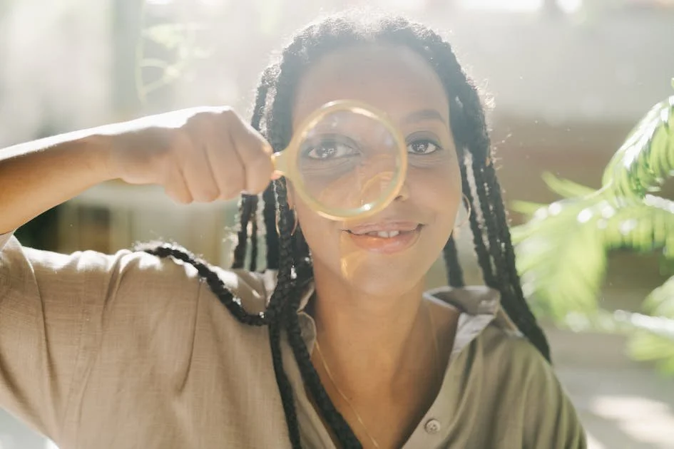 woman-using-magnifying-glass-to-inspect-wellness-website.jpg