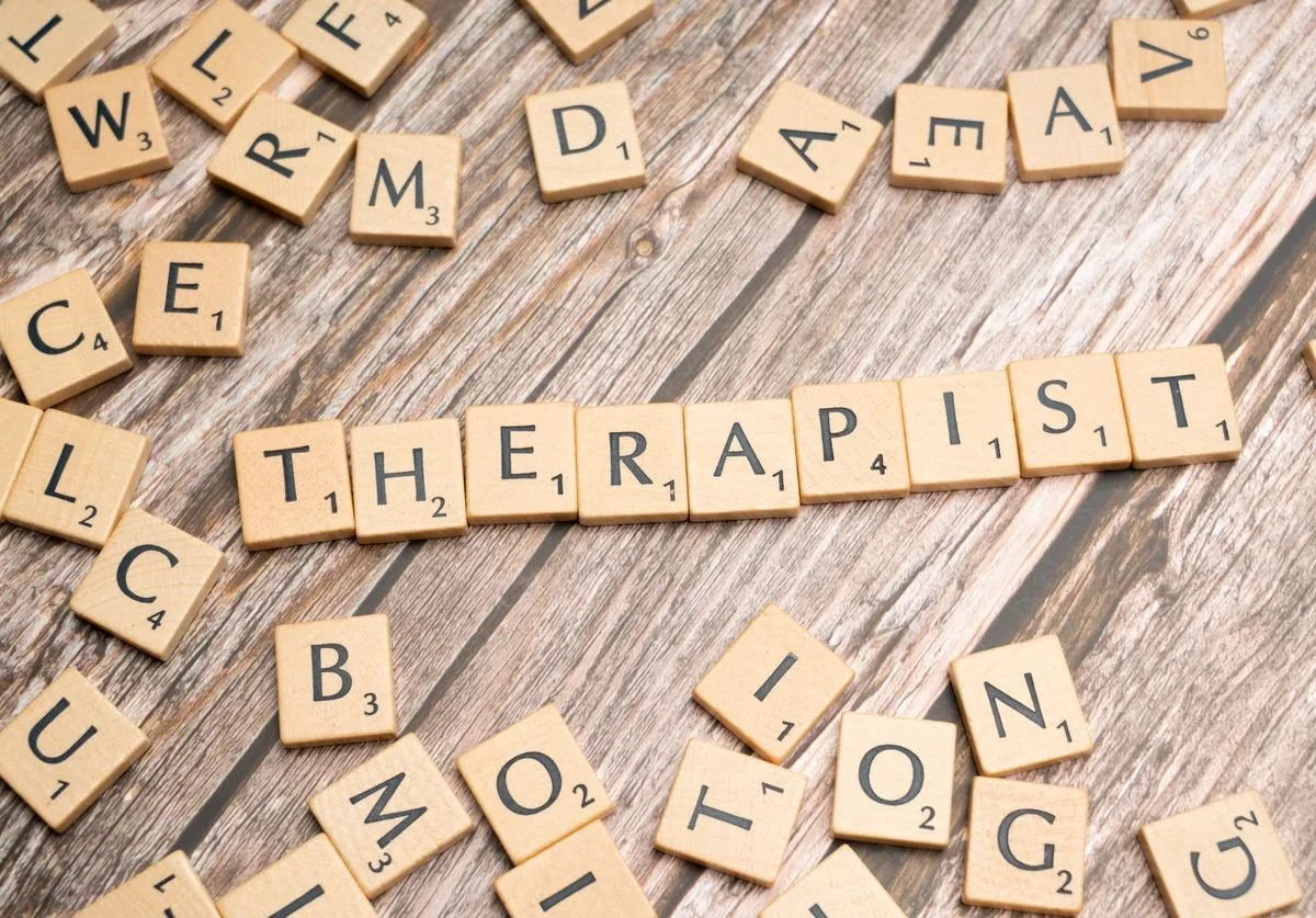 the-word-therapist-spelled-out-in-scrabble-letters-wellness.jpg
