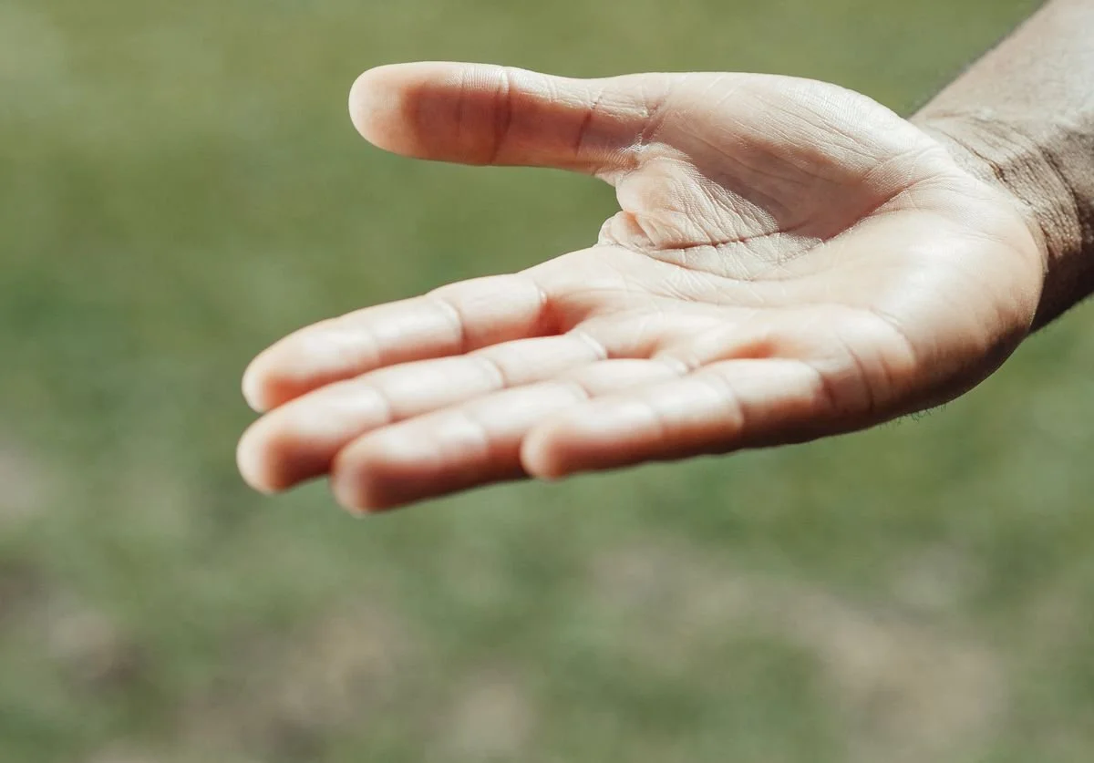 a-man-extending-his-hand-to-welcome.jpg
