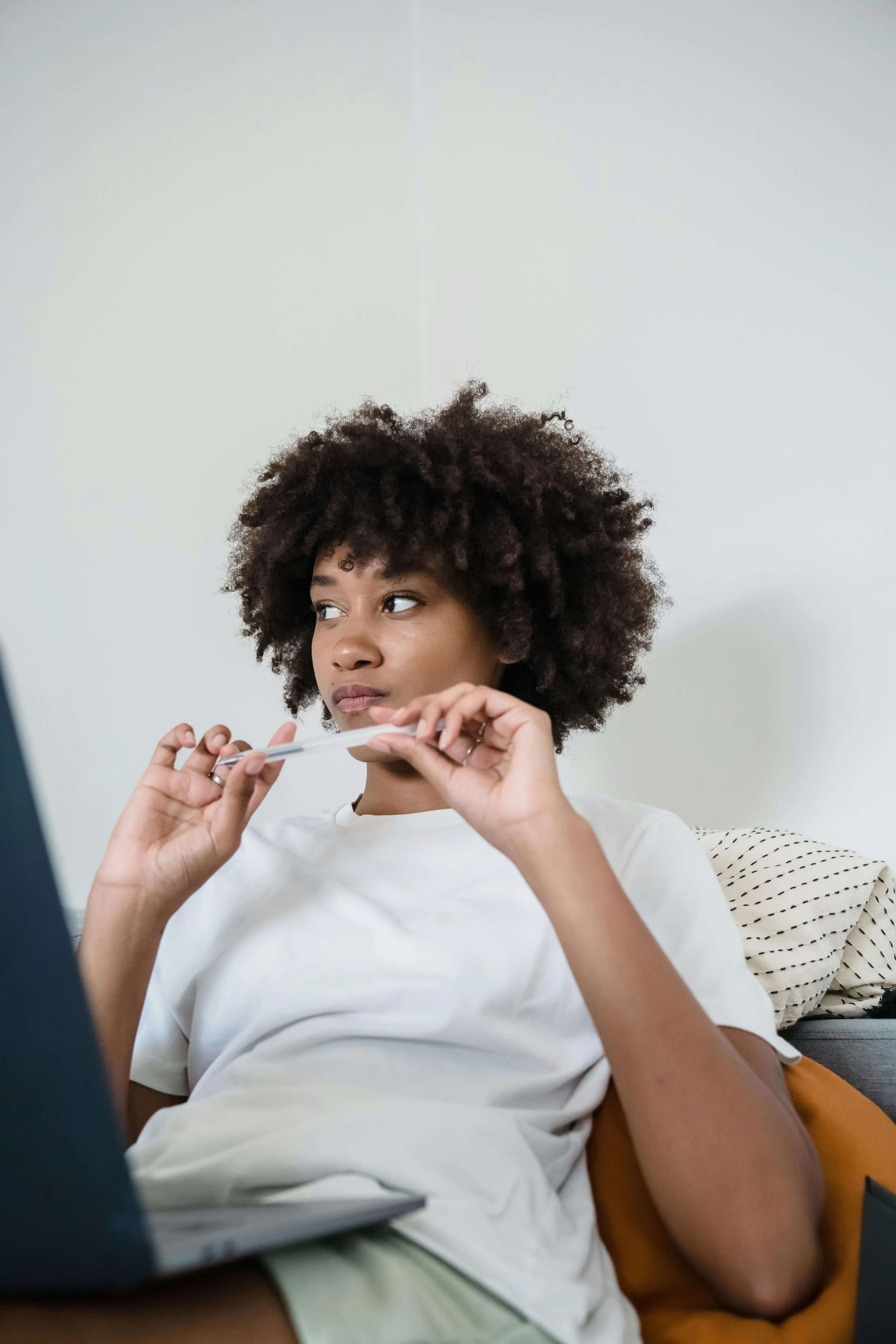 female-thinking of-booking-a-therapist-because-of- her-wellness-healing-website-designer
