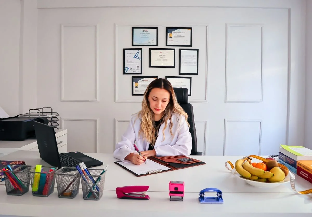 a-welless-doctor-sitting-at-her-desk.jpg