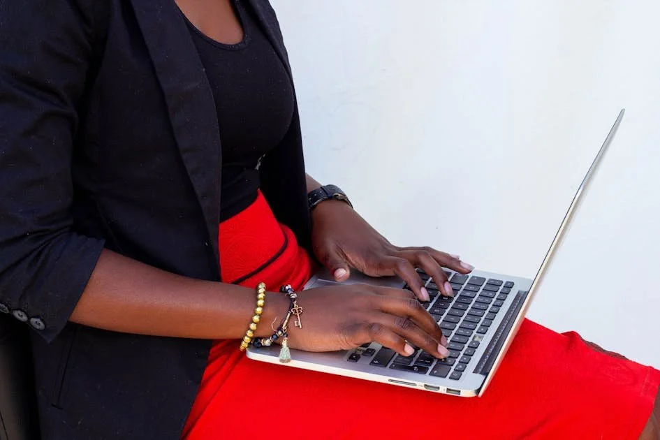 woman-typing-on-her-laptop-about-her-wellness-website.jpg