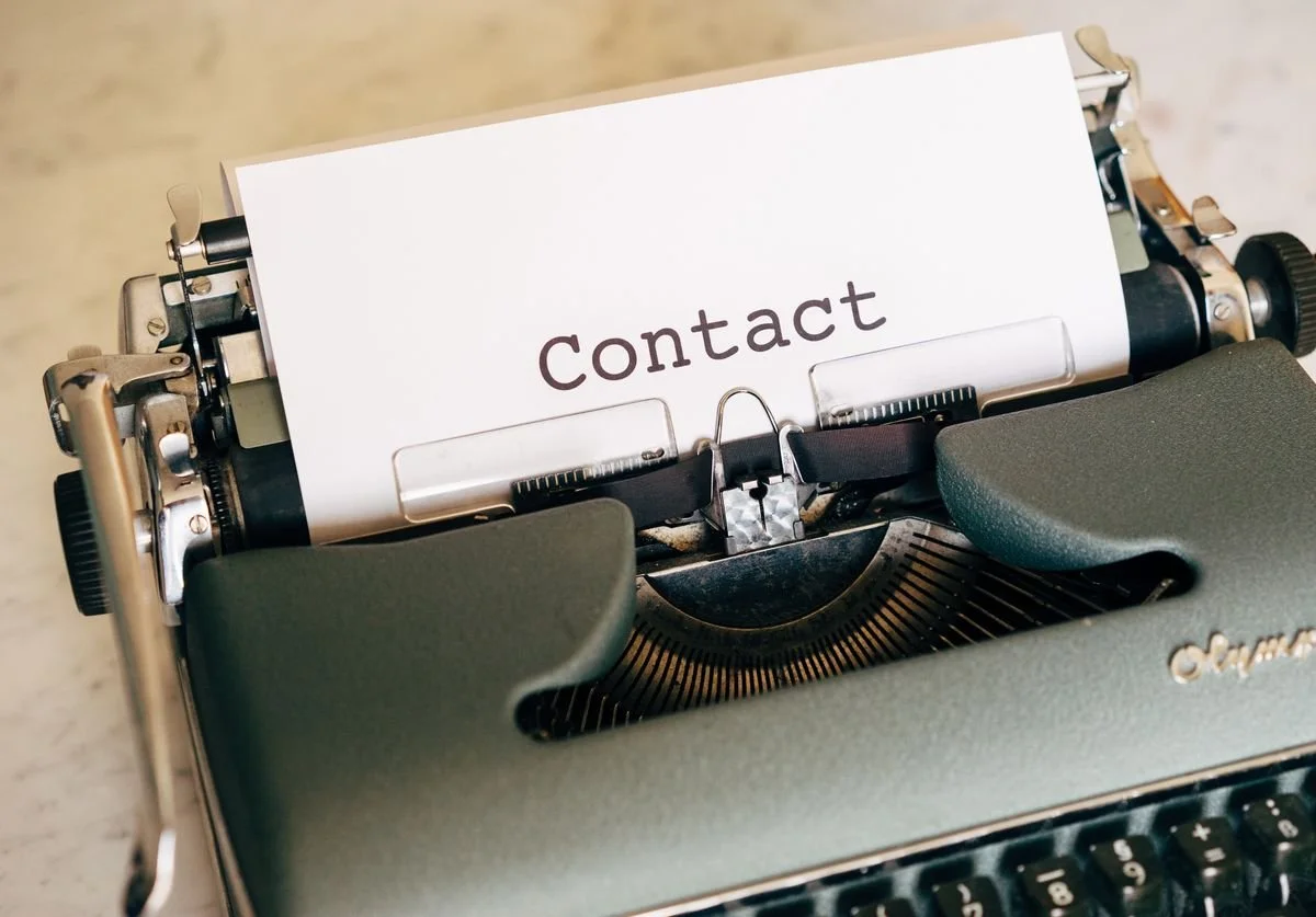 a-typewriter-typing-out-the-word-contact.jpg