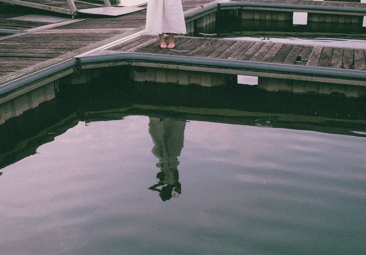 woman-seeing-reflection-in-the-water.jpg