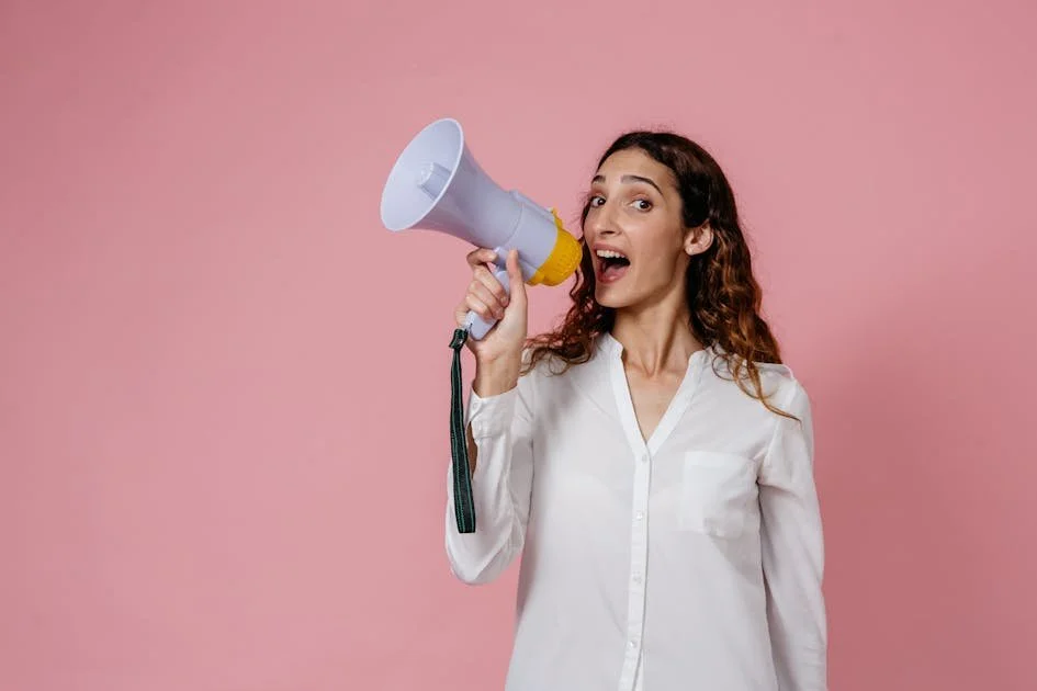 woman-shouting-on-louder-speaker-to-get-a-new-wellness-website.jpg
