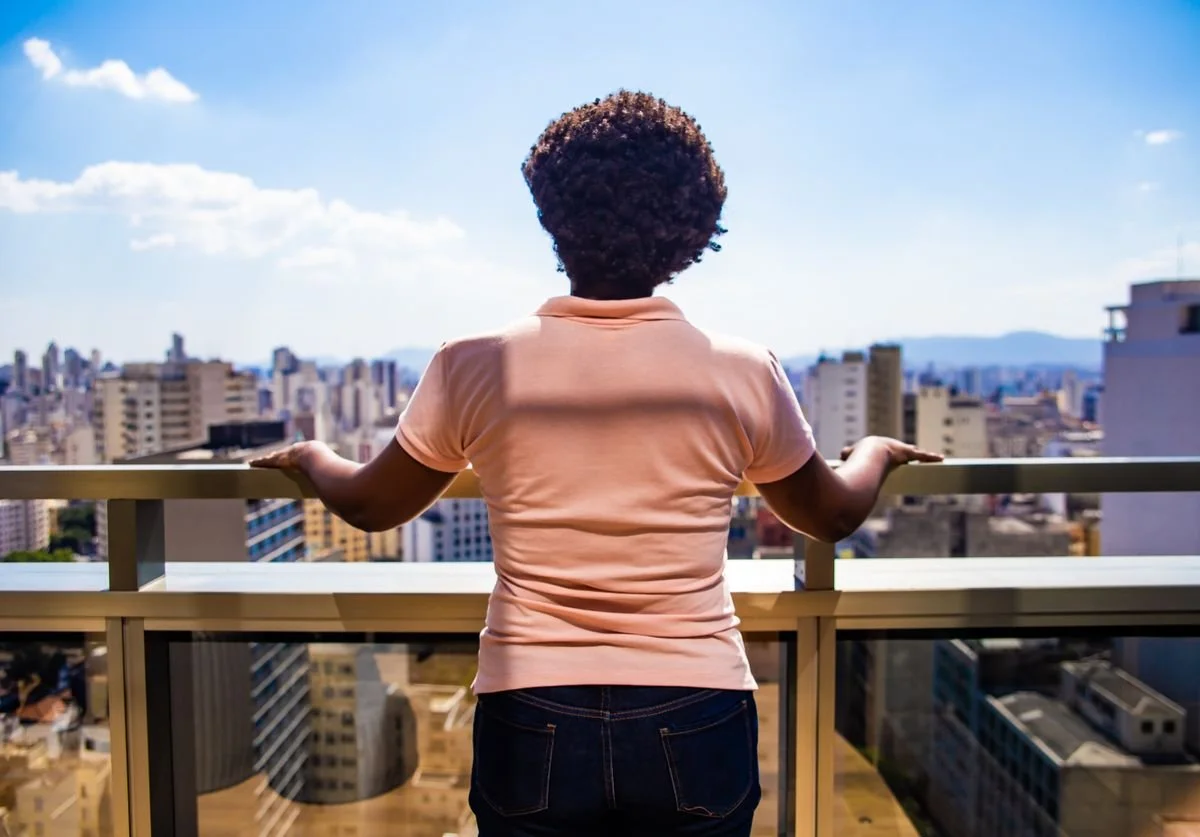 a-woman-looking-out-at-the-view-thinking.jpg
