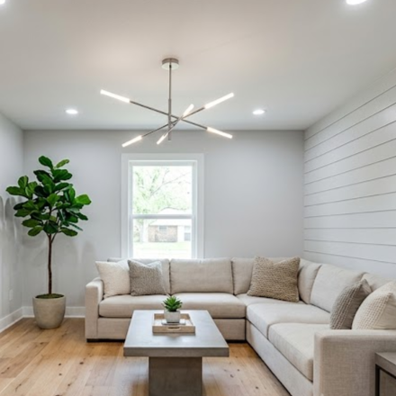 Texas Rooted Home remodeling - commercial remodel after photo- professional painting wall- drywall repair-flooring installation-lighting upgrades, and electrical panel installation via third party electrical license contractor- ceiling light fixture.