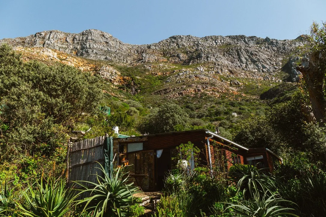 The Stone Cottage Dwarfed by the Mountain