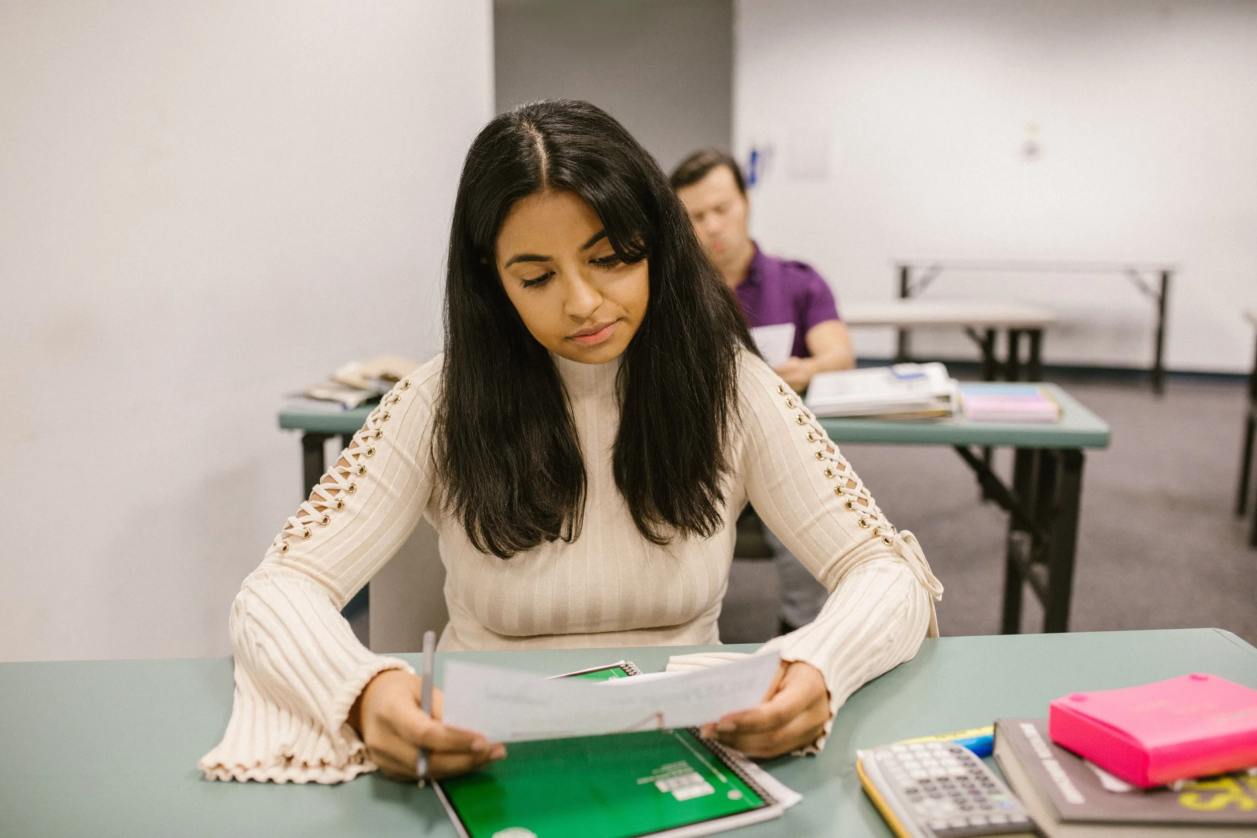 college student looking at their grade, dissapointed