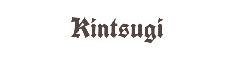 Le mot 'Kintsugi' écrit en lettres noires sur un fond blanc.