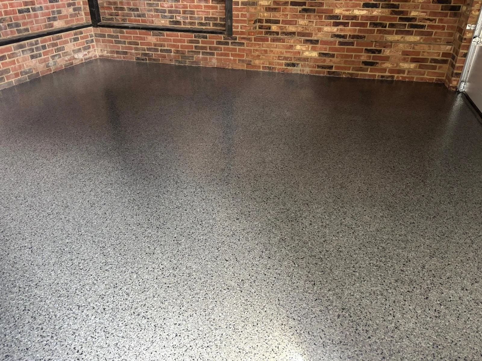 newly laid resin floor with flake system