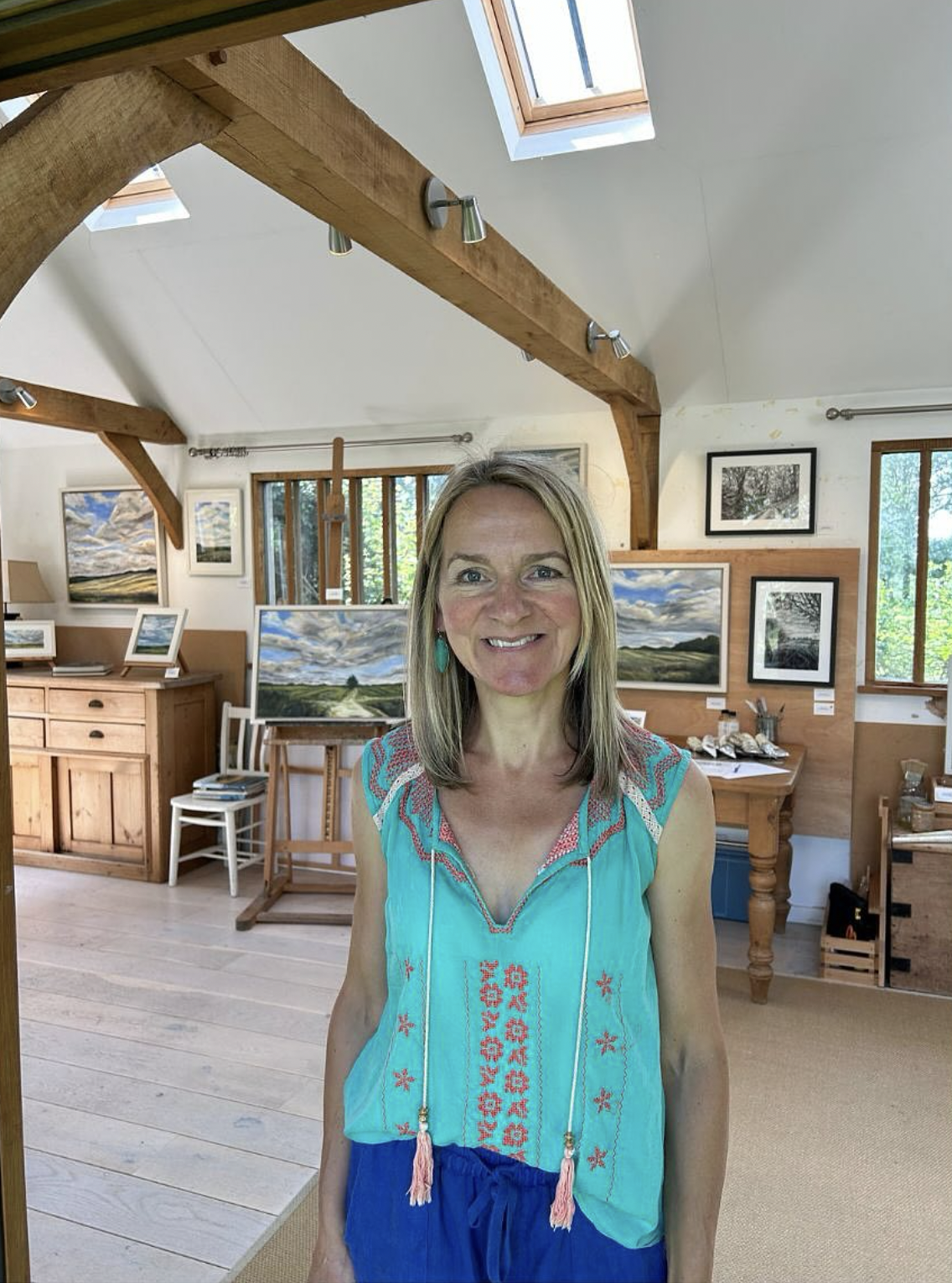 Portrait of artist Suzanne Winn in her studio