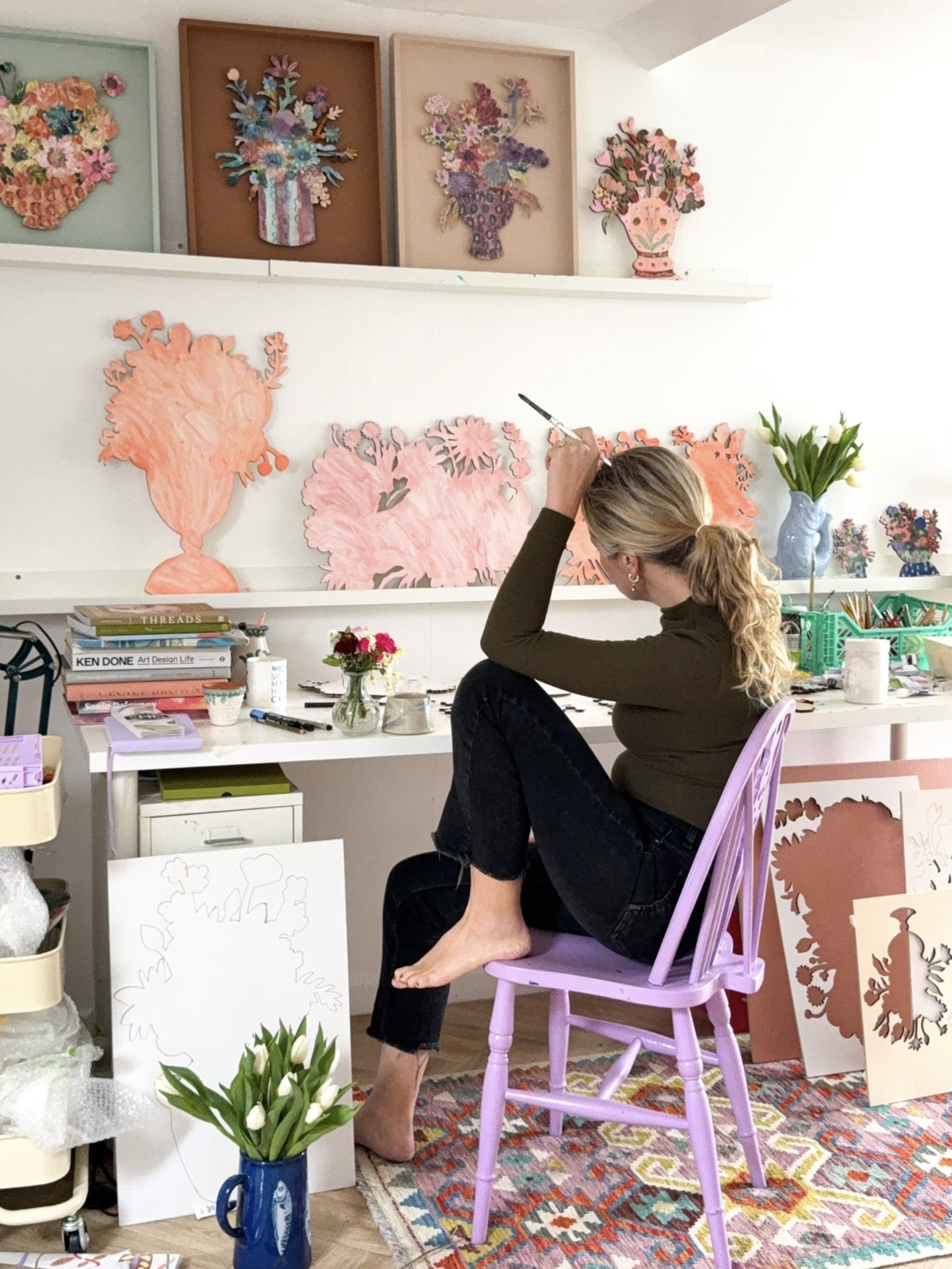 Portrait of artist Lucy Innes Williams in her studio
