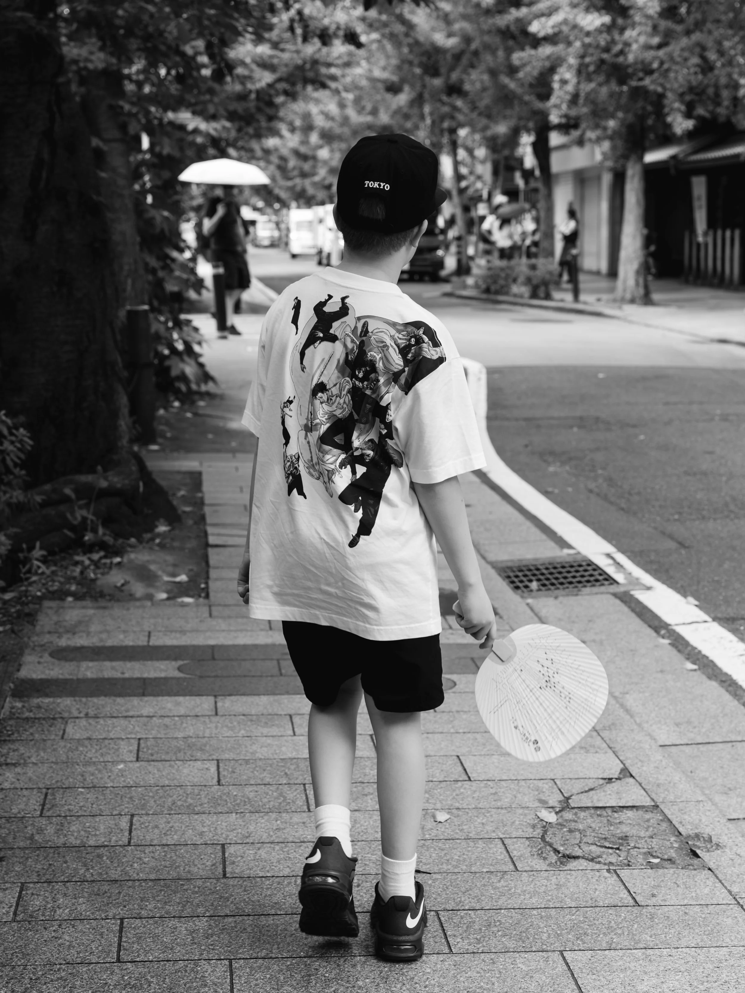 🪭 

I caption this one &lsquo;Boy meets Japan&rsquo;. 

I didn&rsquo;t realise until viewing the images later when we returned home that he&rsquo;s wearing a Jujutsu Kaisen shirt, &lsquo;Stormy&rsquo; (Japanese skate brand) TOKYO hat and carrying hi