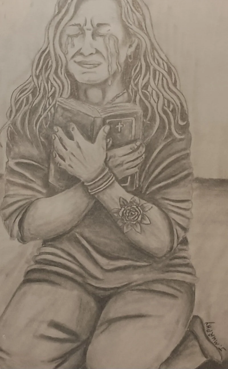 Girl crying holding bible 2.jpg