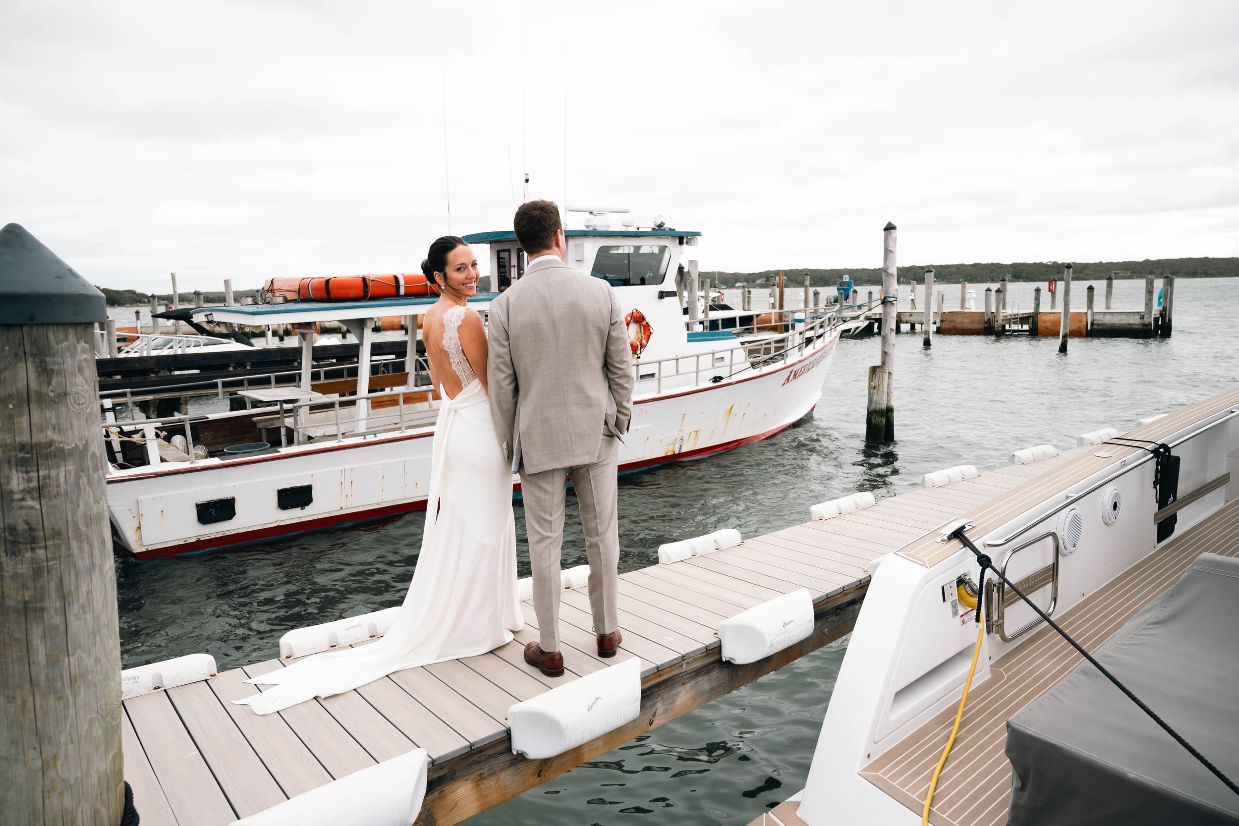 Bride and groom portrait on boat dock in East Hampton 