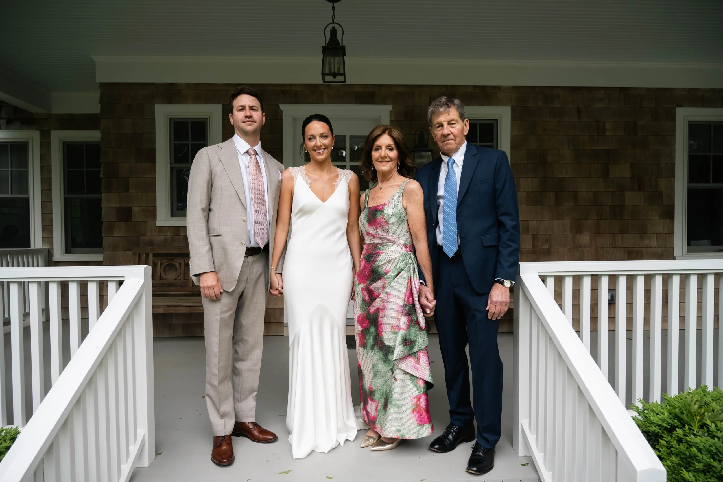 Bride, groom, and family picture at family home in Sag Harbor
