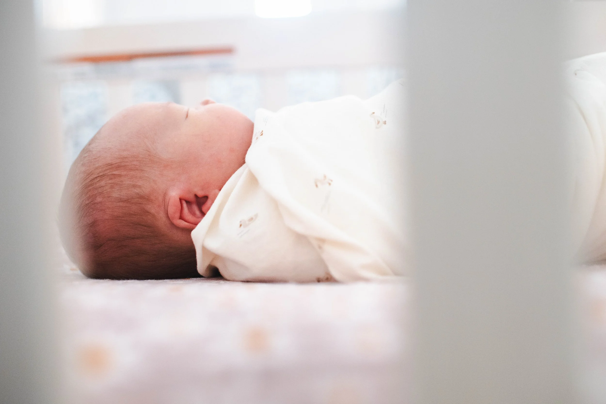bright-airy-newborn-crib-photos-nyc.jpg