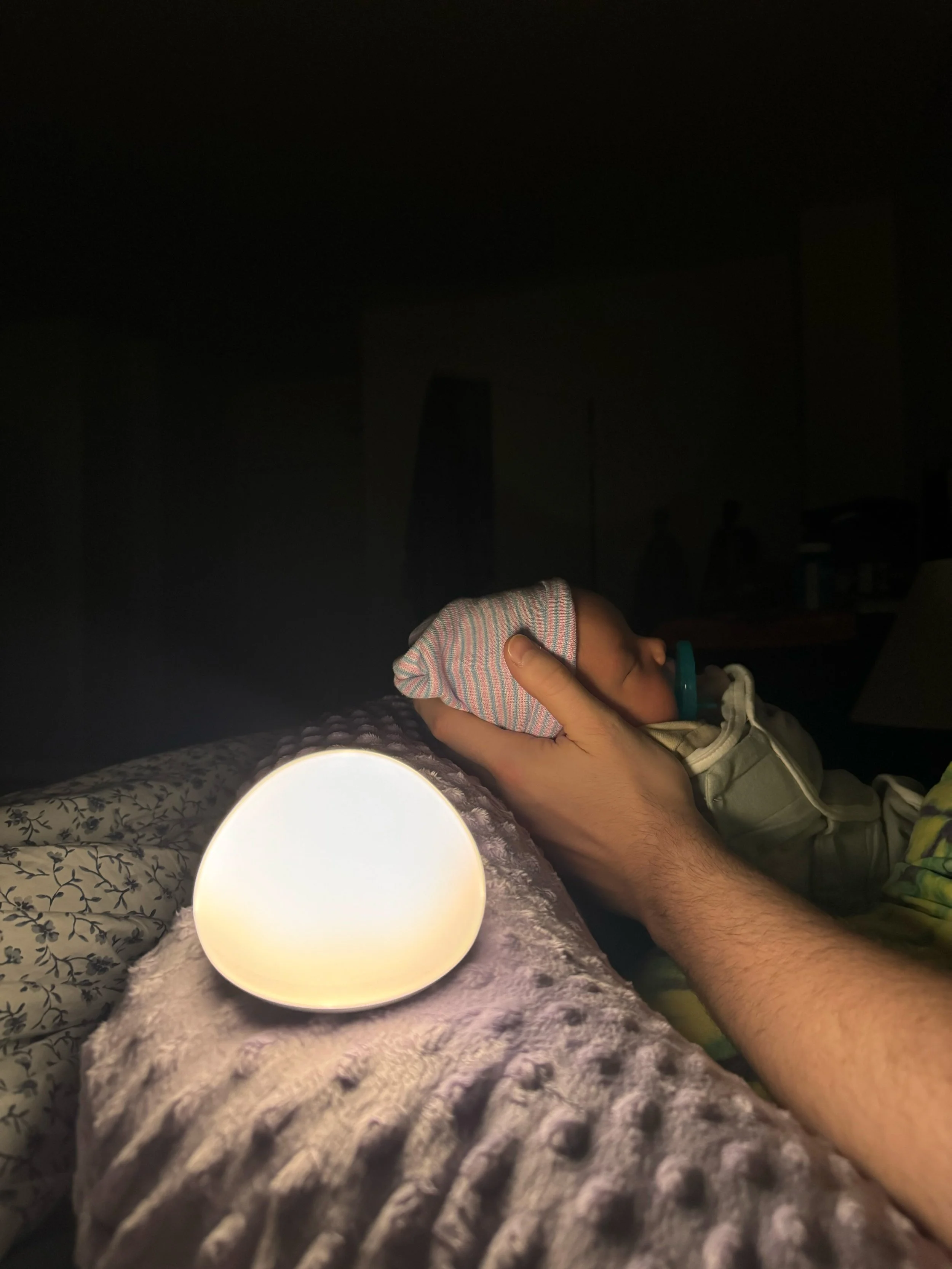 late-night-newborn-comfort-moody-lighting.jpg