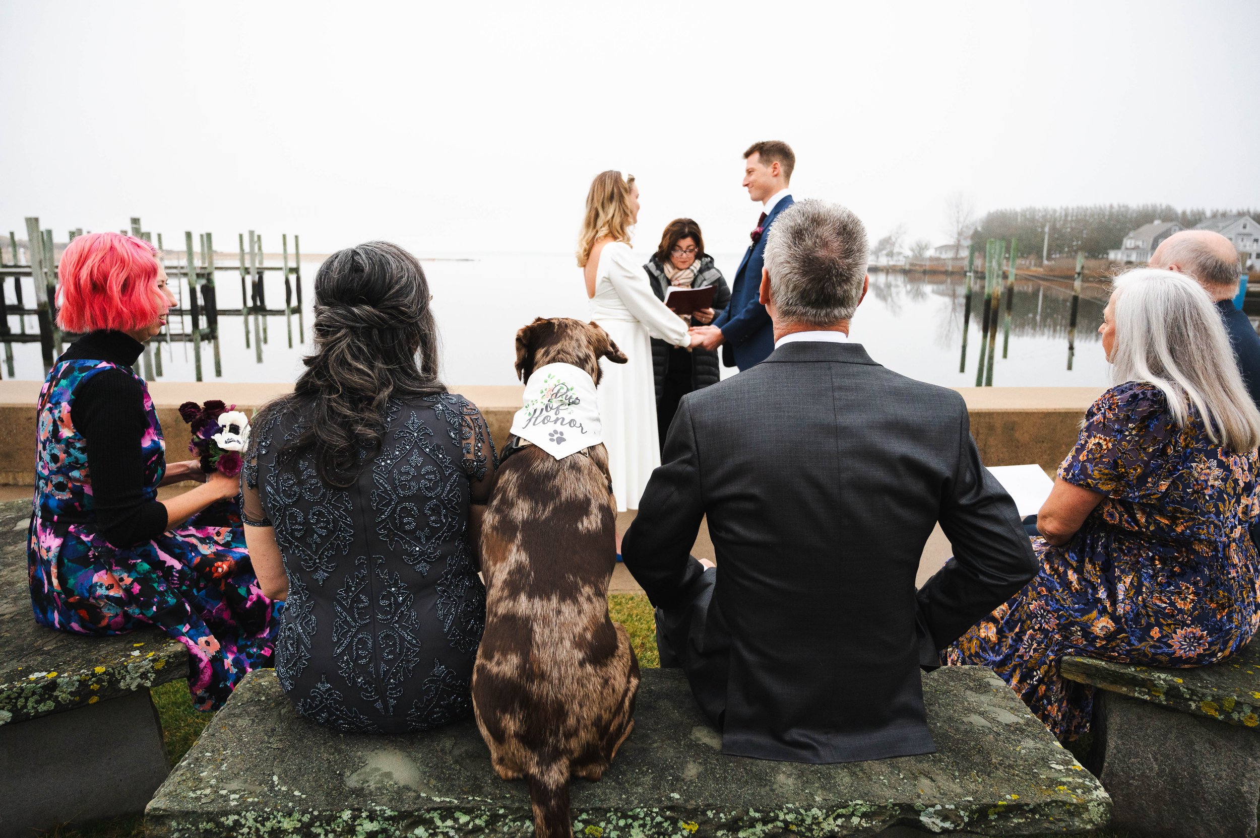 Family watching the outdoor wedding ceremony in Watch Hill Rhode Island