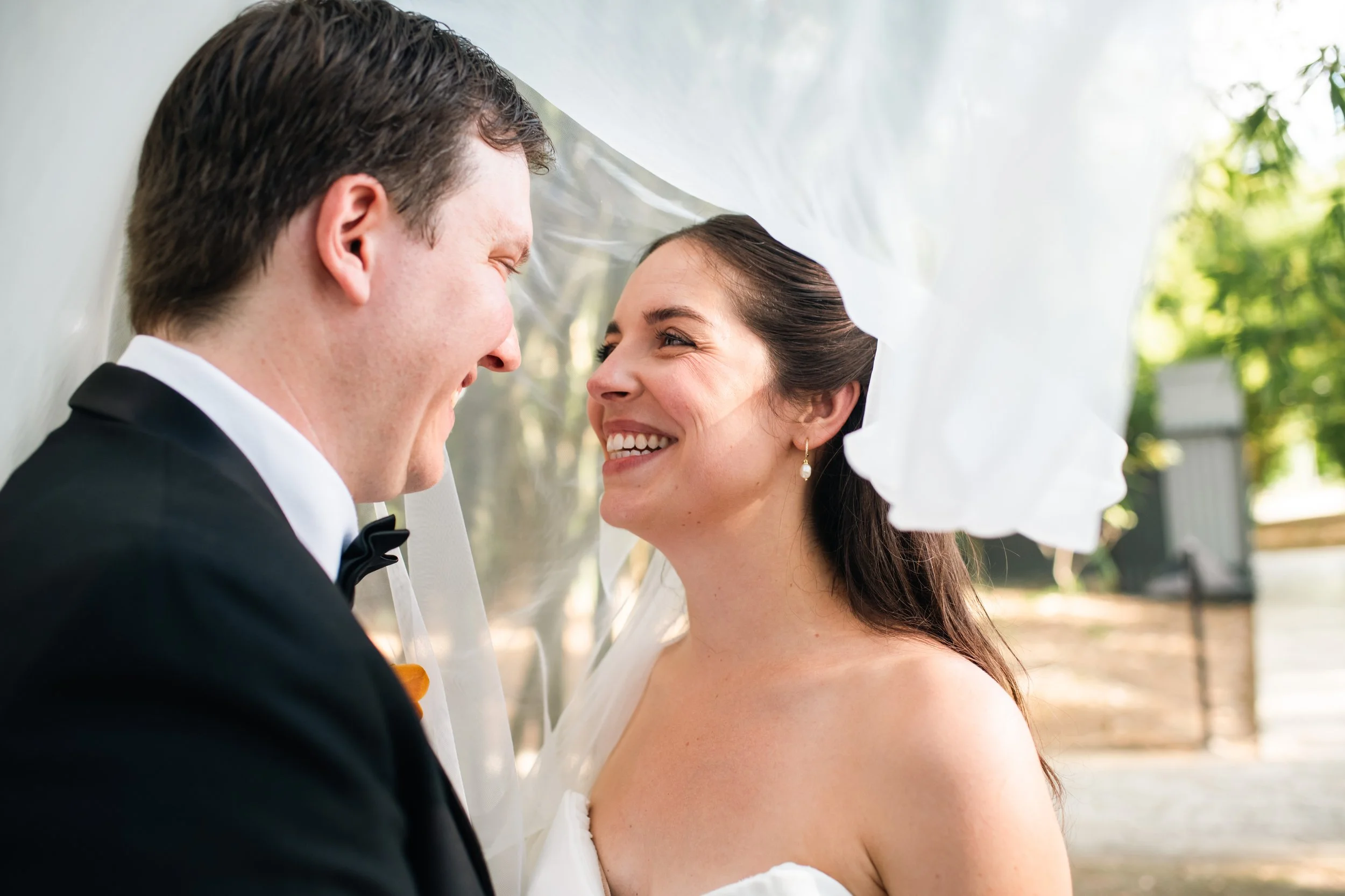 bride-groom-smiling-under-veil-mapr-san-juan-puerto-rico-wedding.jpg