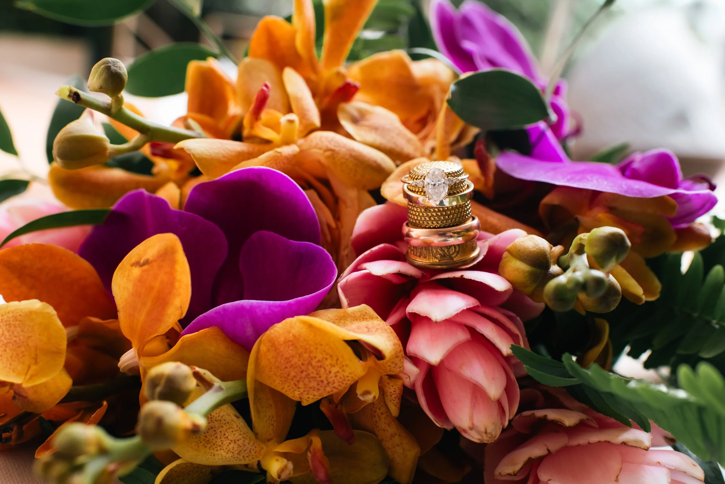 wedding-rings-on-tropical-orchid-bouquet-mapr-san-juan-puerto-rico-wedding.jpg
