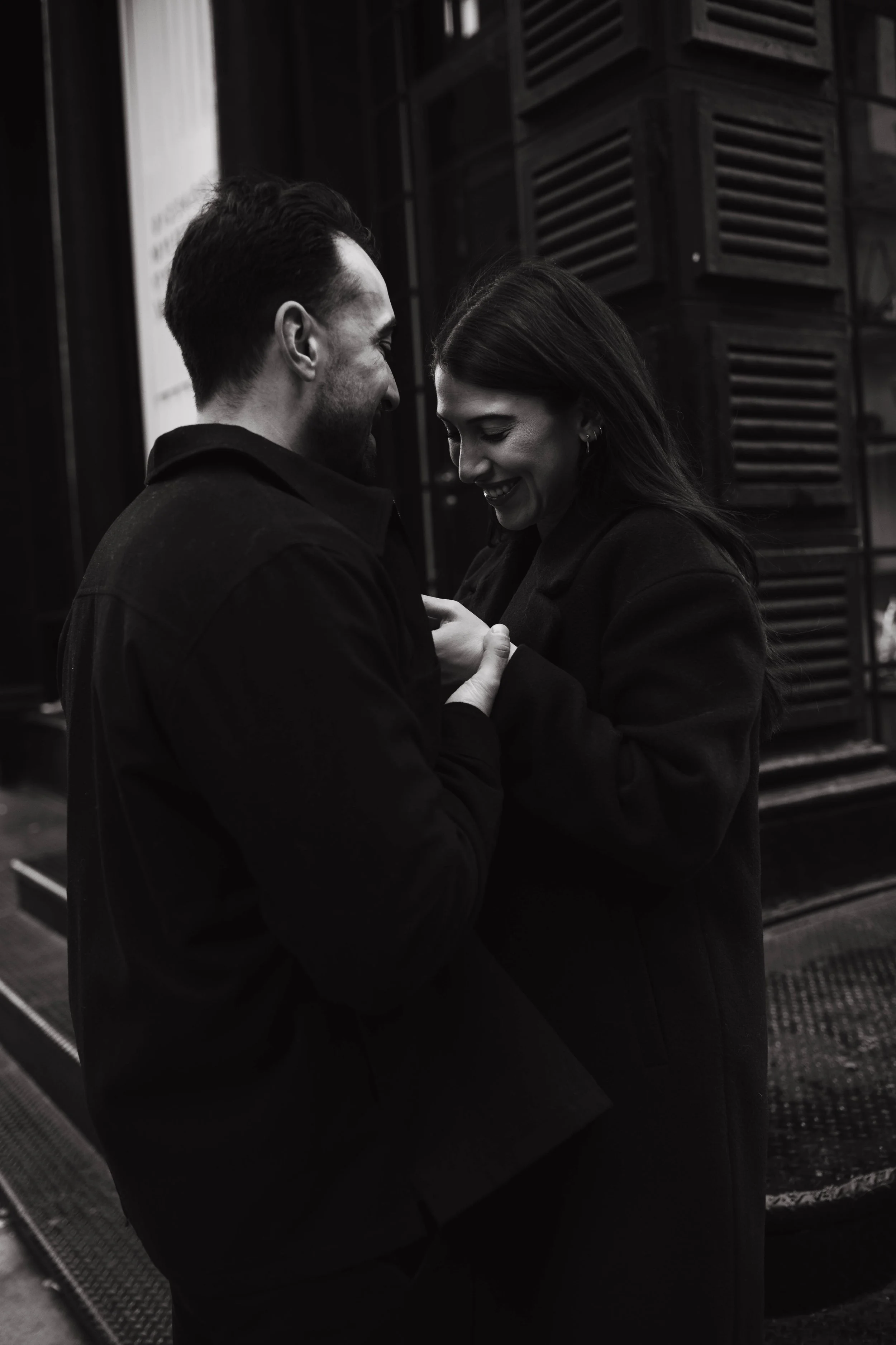 Couple embracing during an engagement photoshoot in SoHo New York City