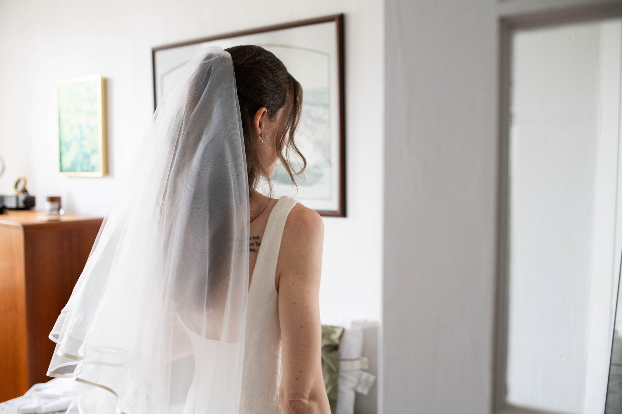 Detail shot of a bride's veil at home in Brooklyn before her wedding ceremony