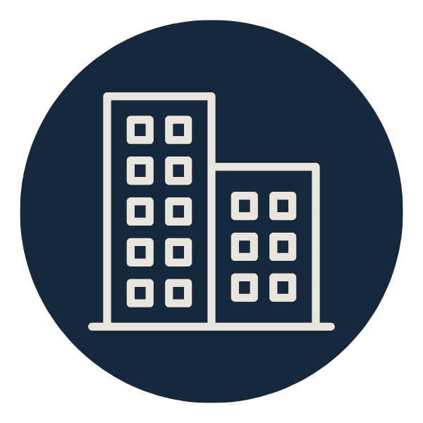 Icon of two tall office buildings with multiple windows.
