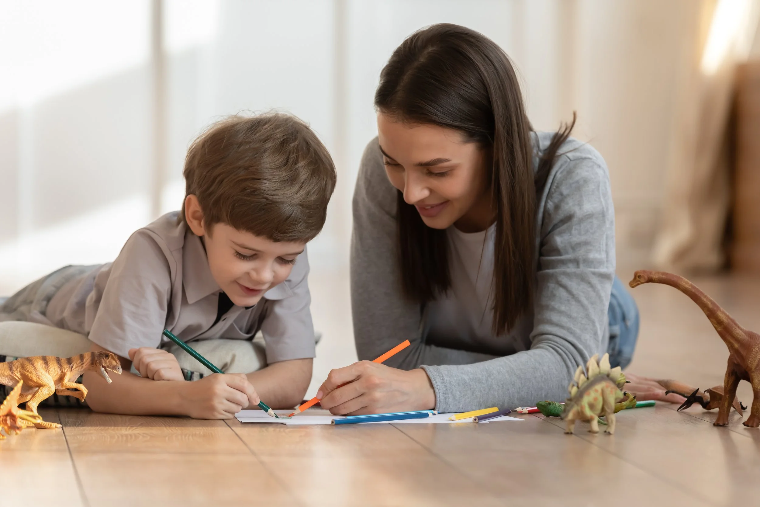 play therapist and child in a play therapy session