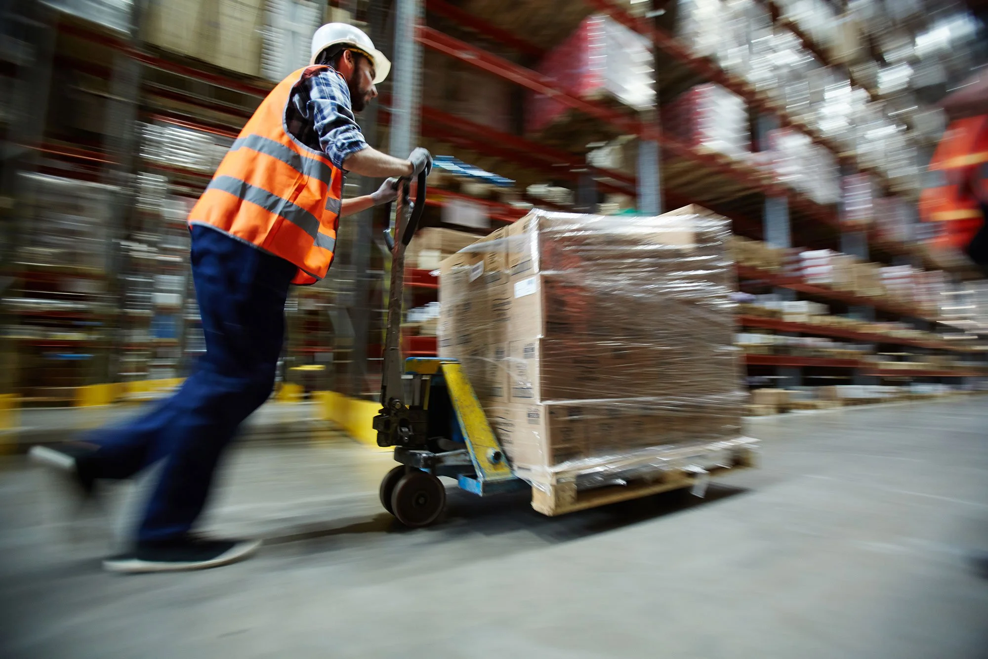 warehouse worker moving boxes