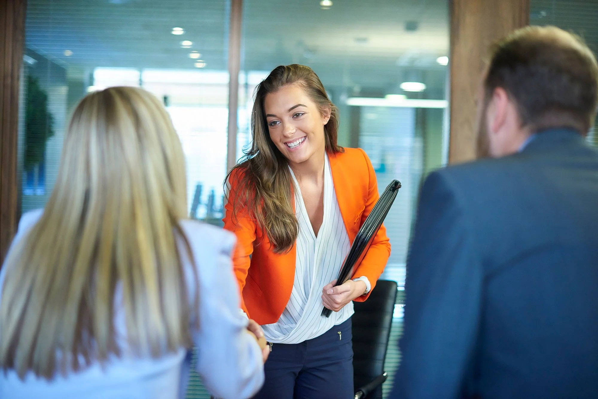 business women shaking hands