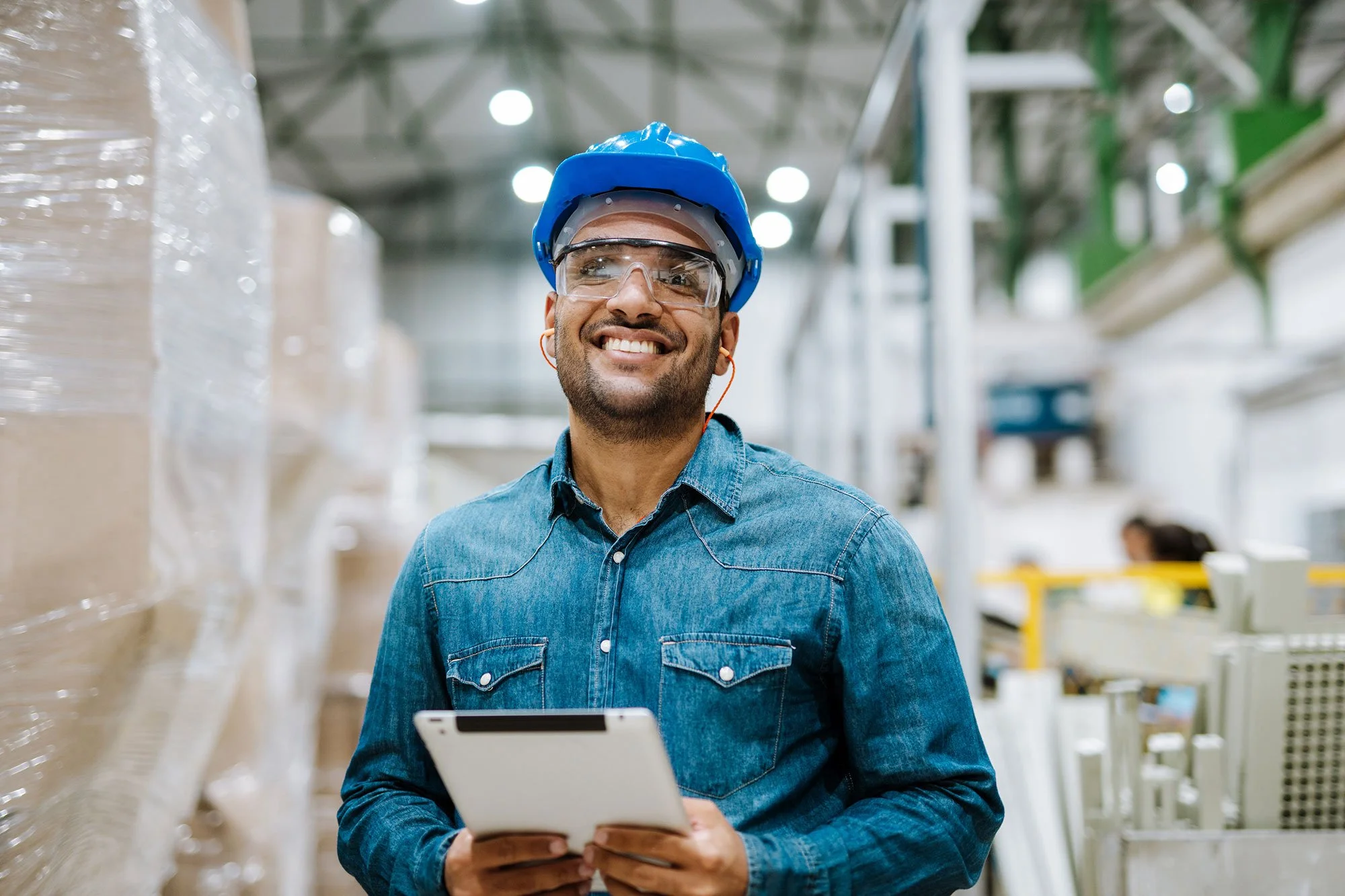 Warehouse manager smiling