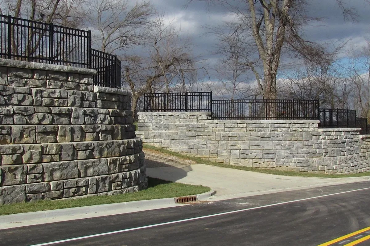 Engineered Redi-Rock retaining wall blocks used for commercial site development in Eastern North Carolina.
