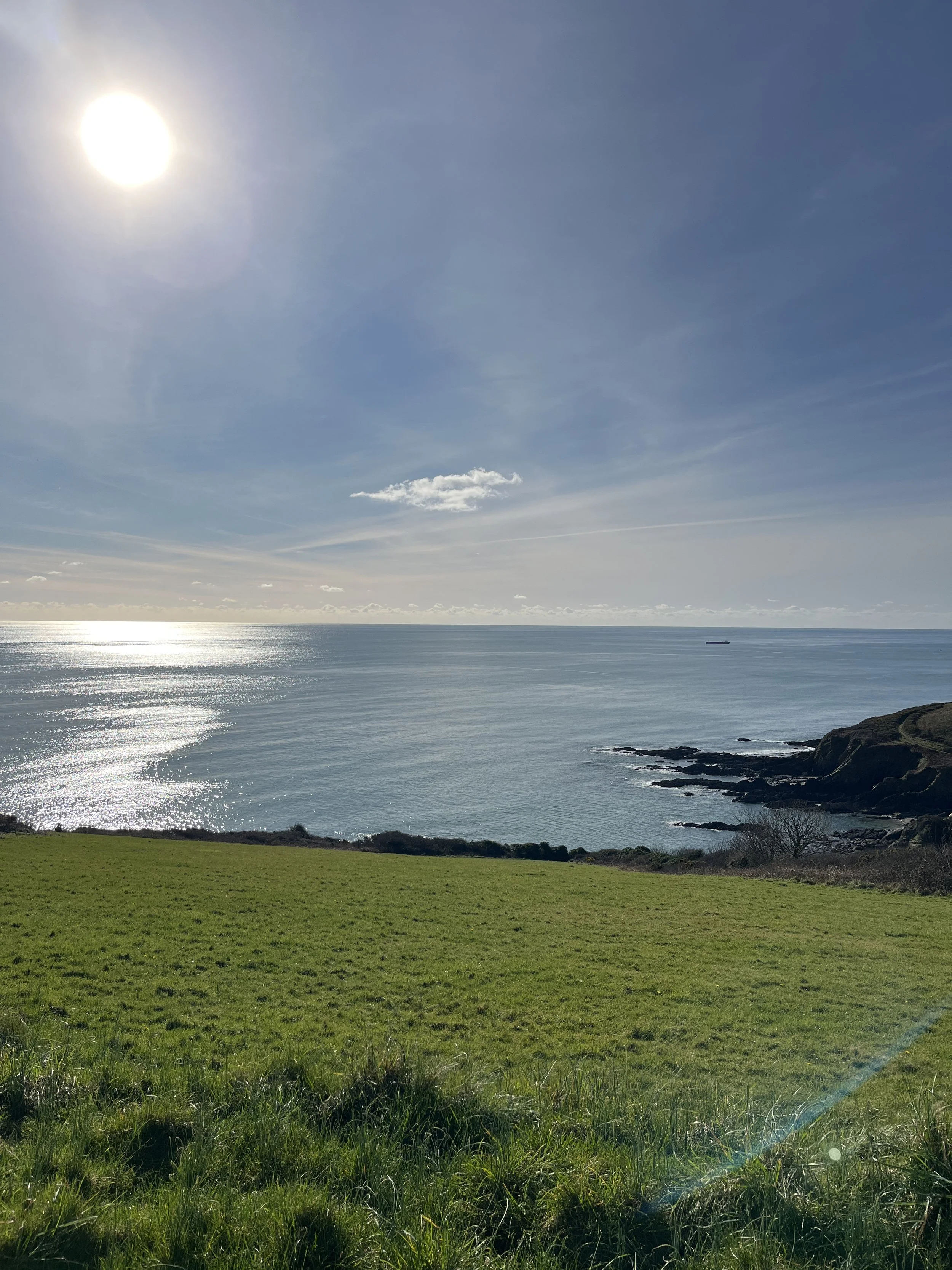 The Cornish sea on a clear day, viewed from the coast path.