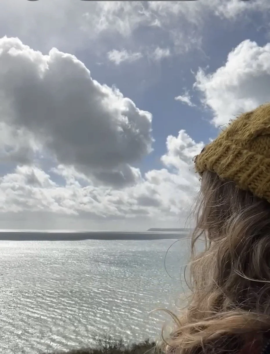 Laura Jessica Walker, side profile, looking out to the Cornish sea.