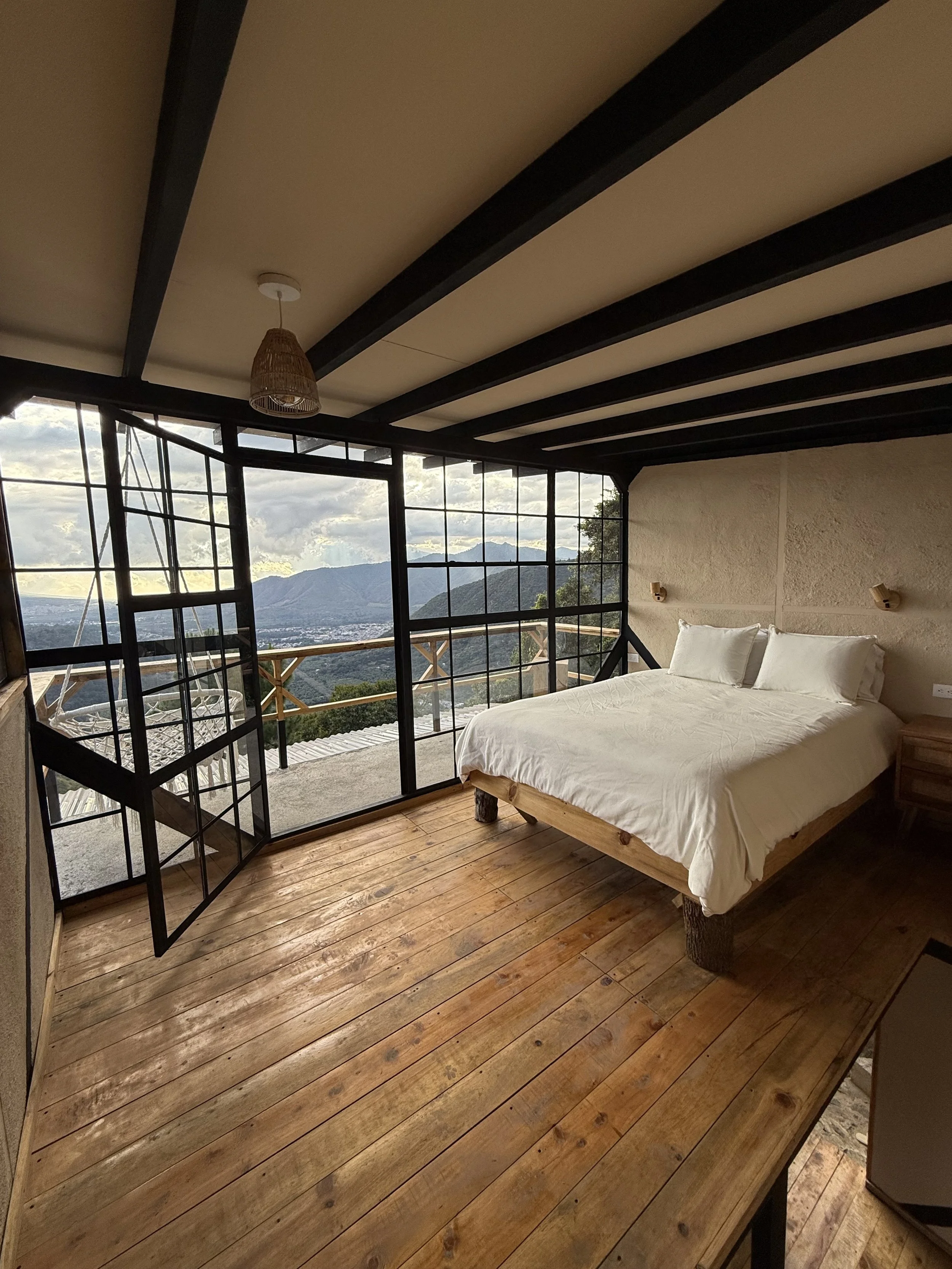 Accommodations for Heather Serna’s upcoming yoga retreat. Experience a peaceful, neutral aesthetic designed for rest and deepening your yoga practice.