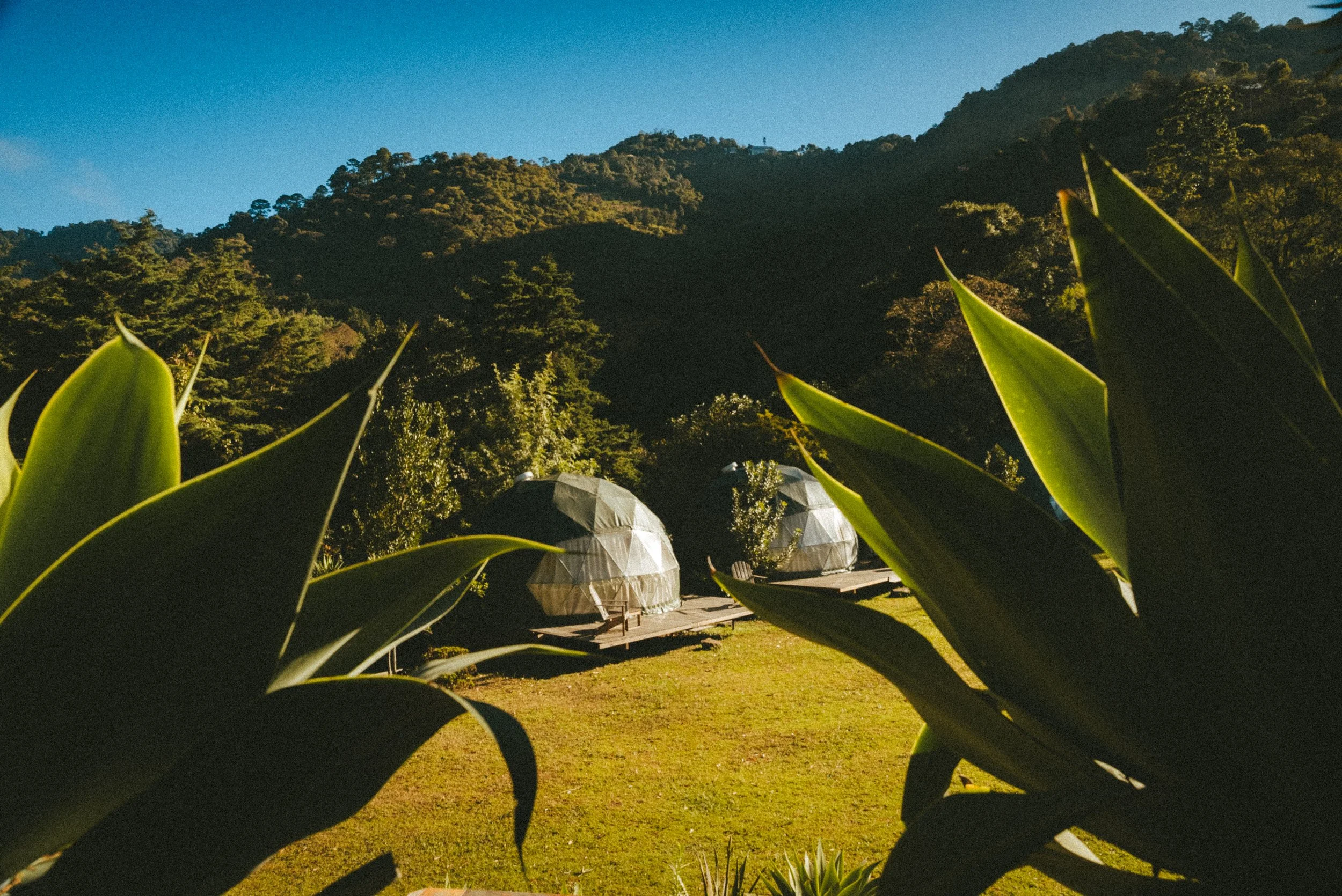 Glamping and outdoor practice space at a Heather Serna Guatemala yoga retreat. Connecting with nature through traditional Mysore-style practice in a serene mountain setting.