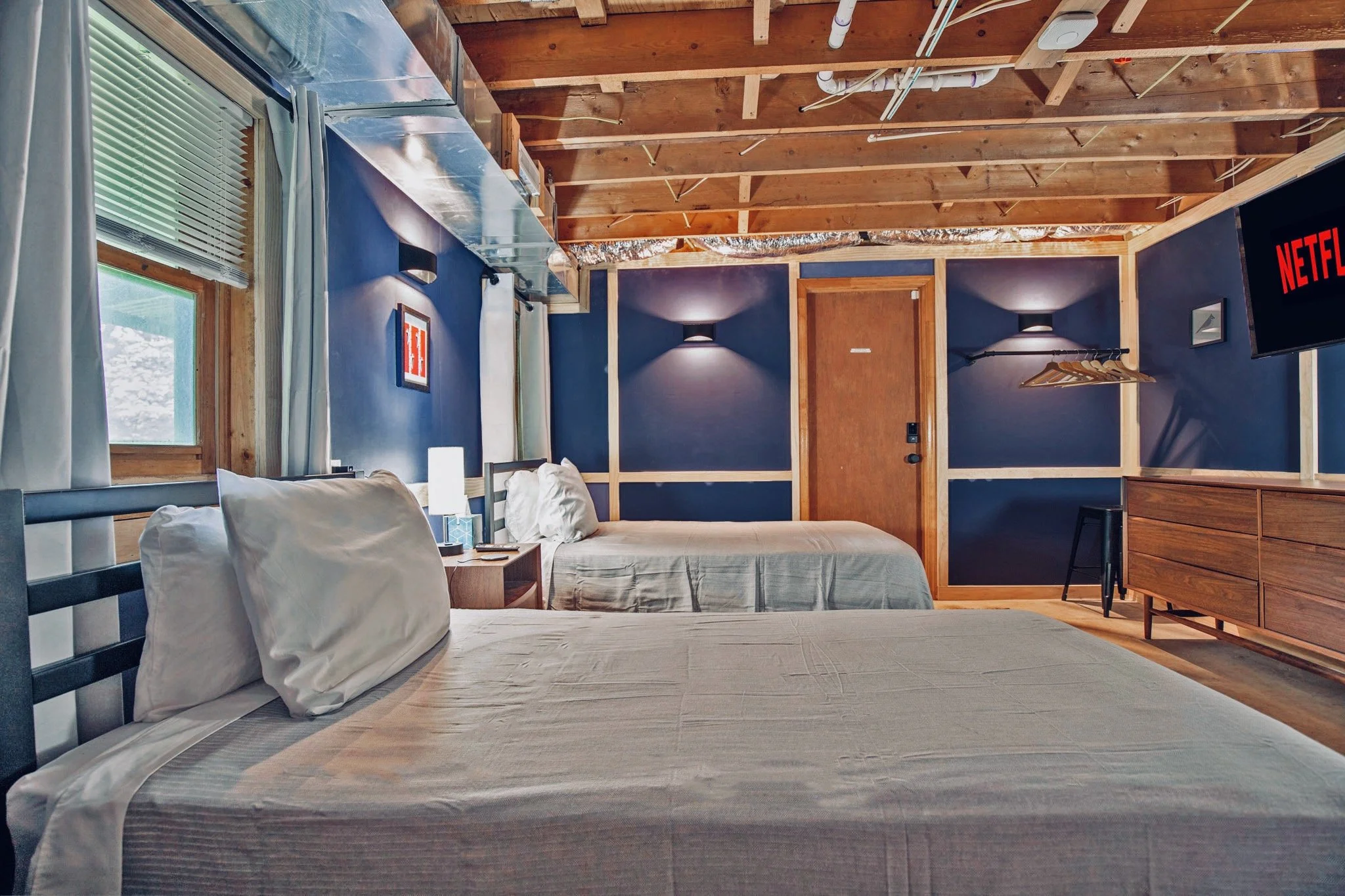 Twin beds in basement hideaway