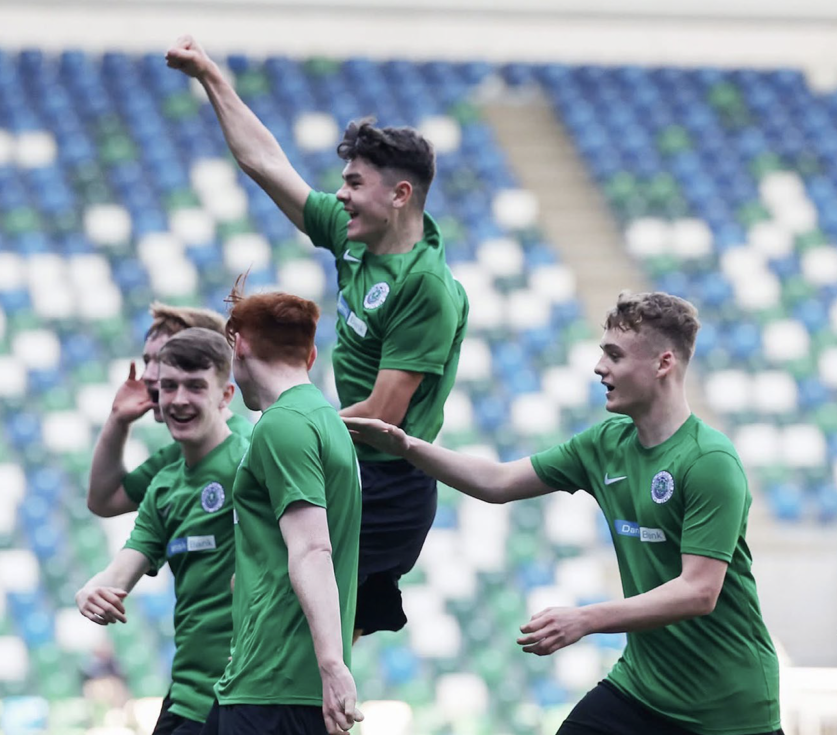 Teammates from St Malachy's College celebrating a win