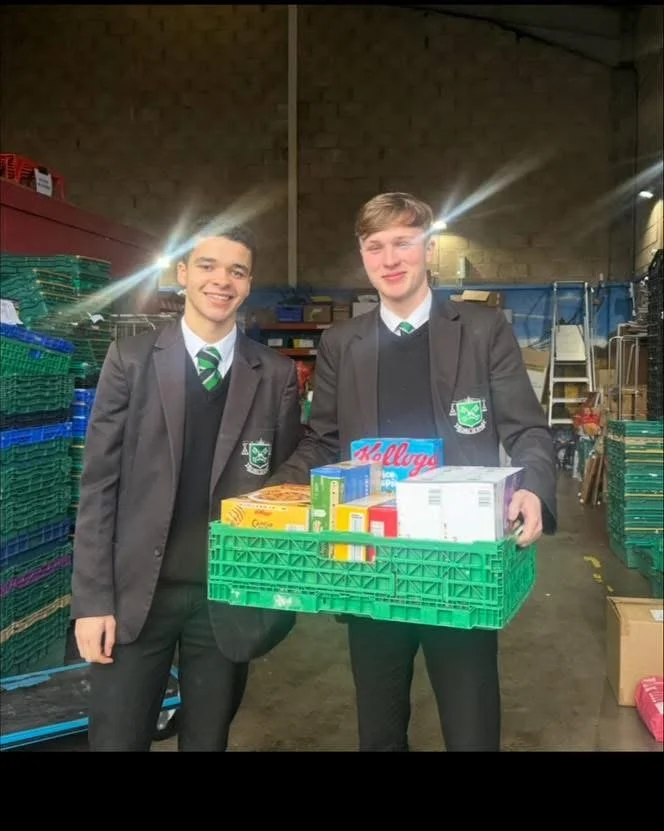 Sixth Form Students from St Malachy's College delivering food parcels to North Belfast Foodbank