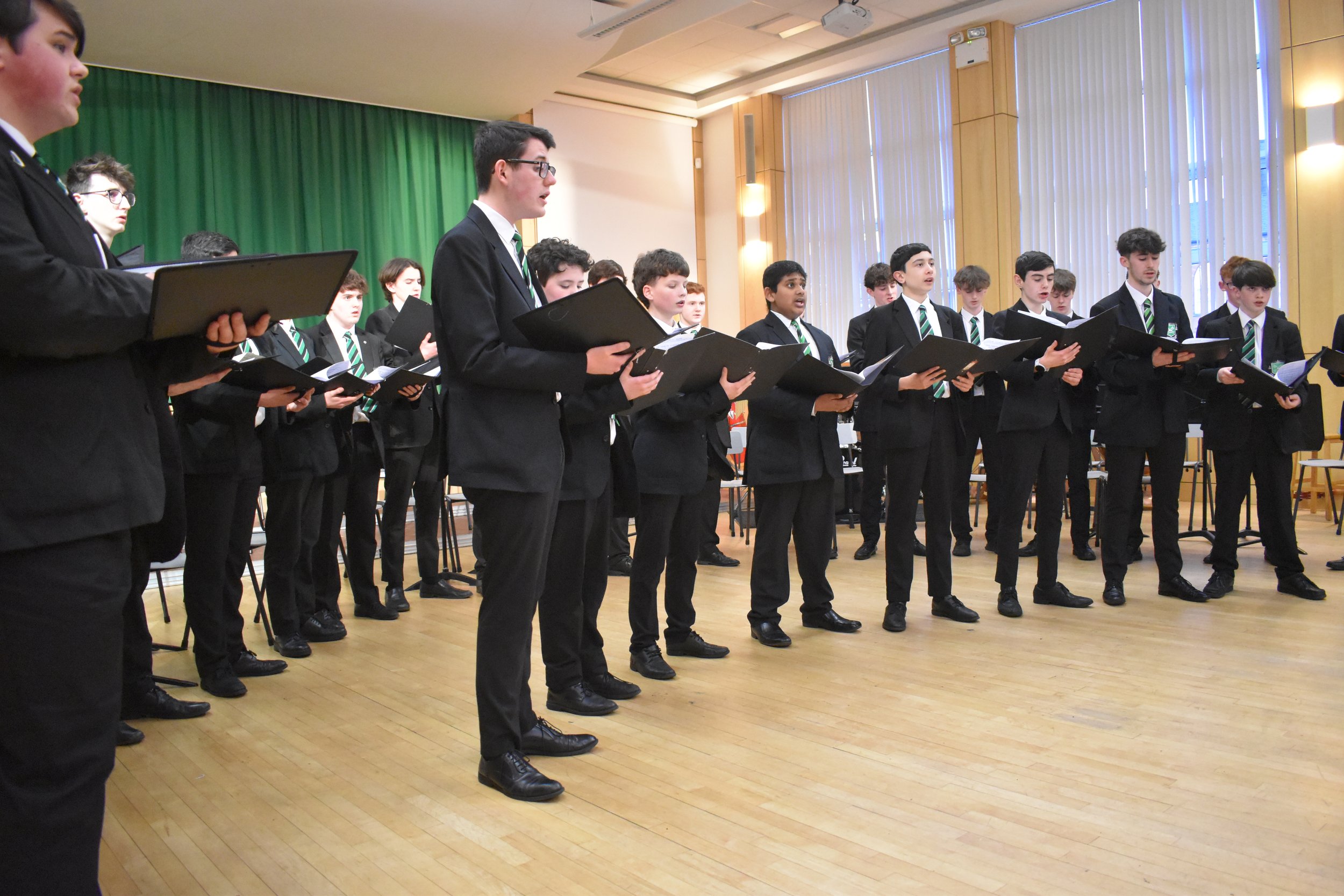 St Malachy's College choir ensemble performing in the College Hall